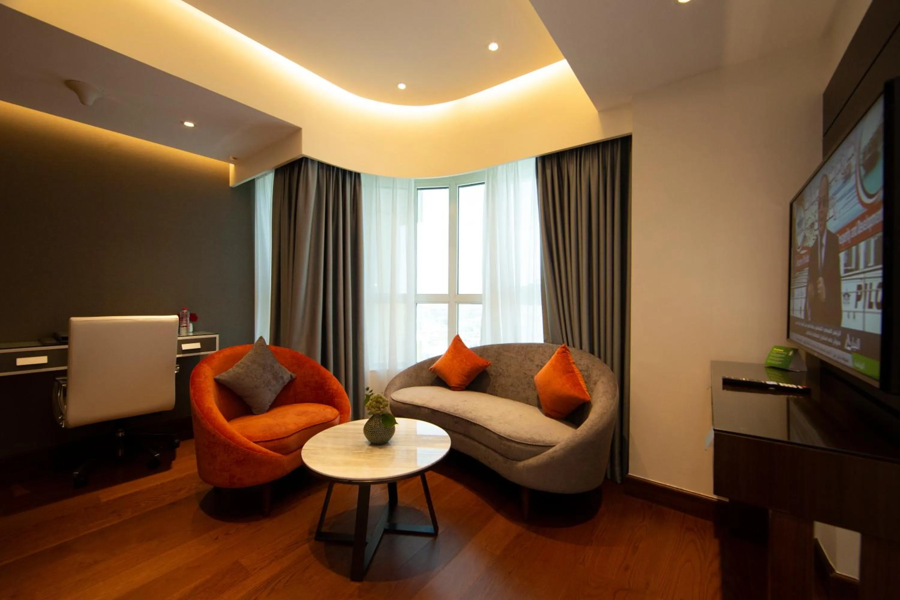 Seating area in Number One Tower Suites