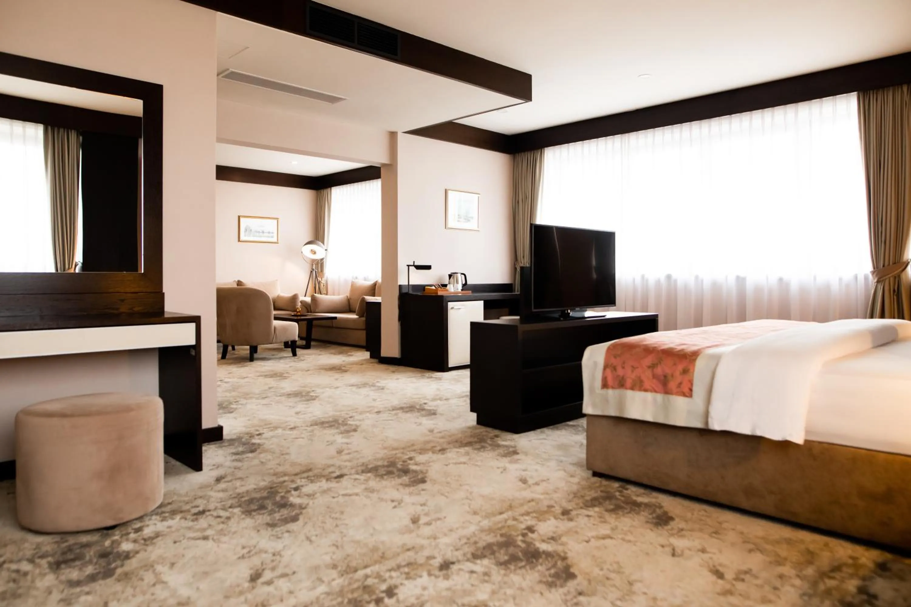 Bed in Malak Regency Hotel