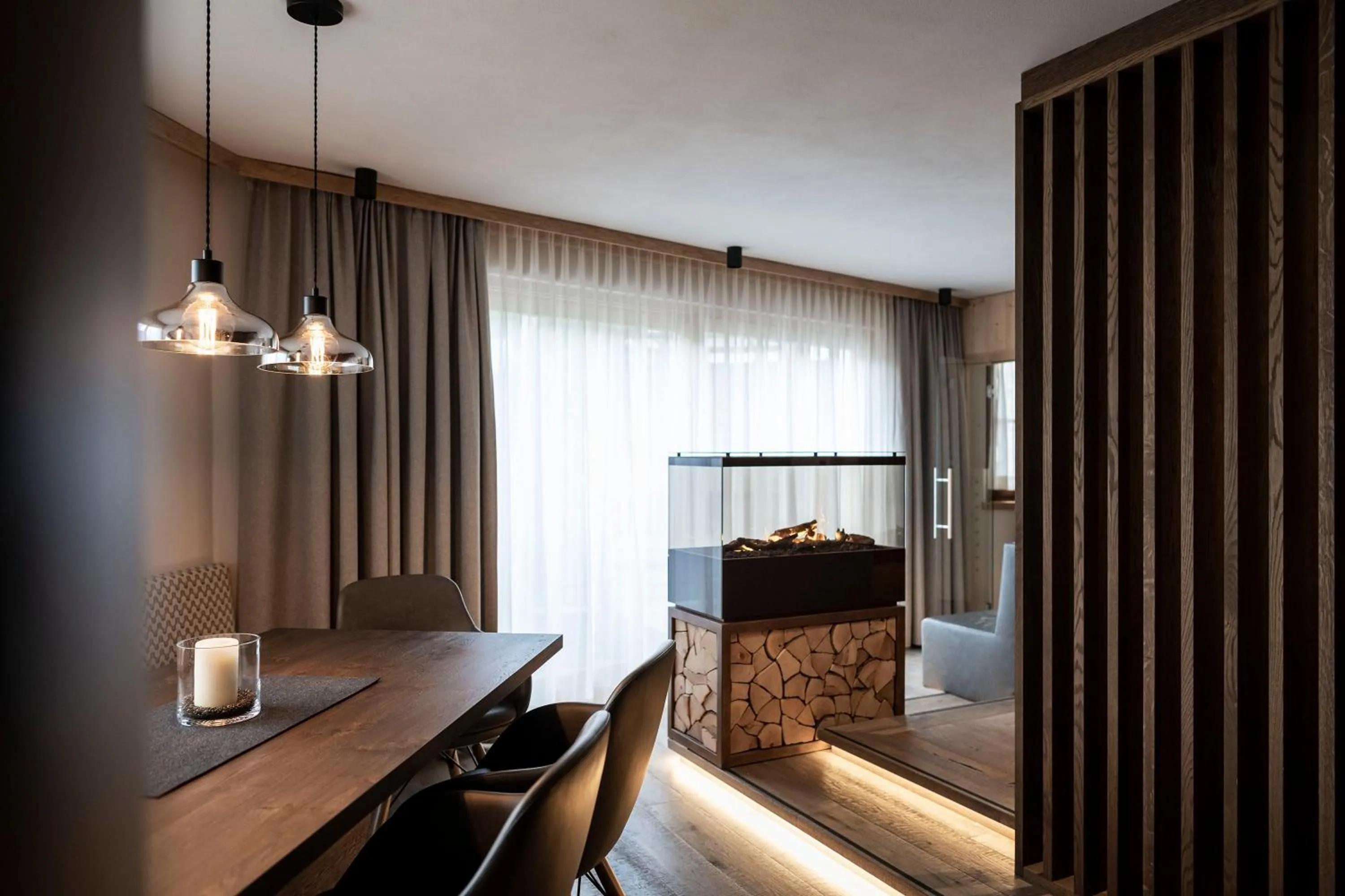 Living room in Post Alpina - Family Mountain Chalets