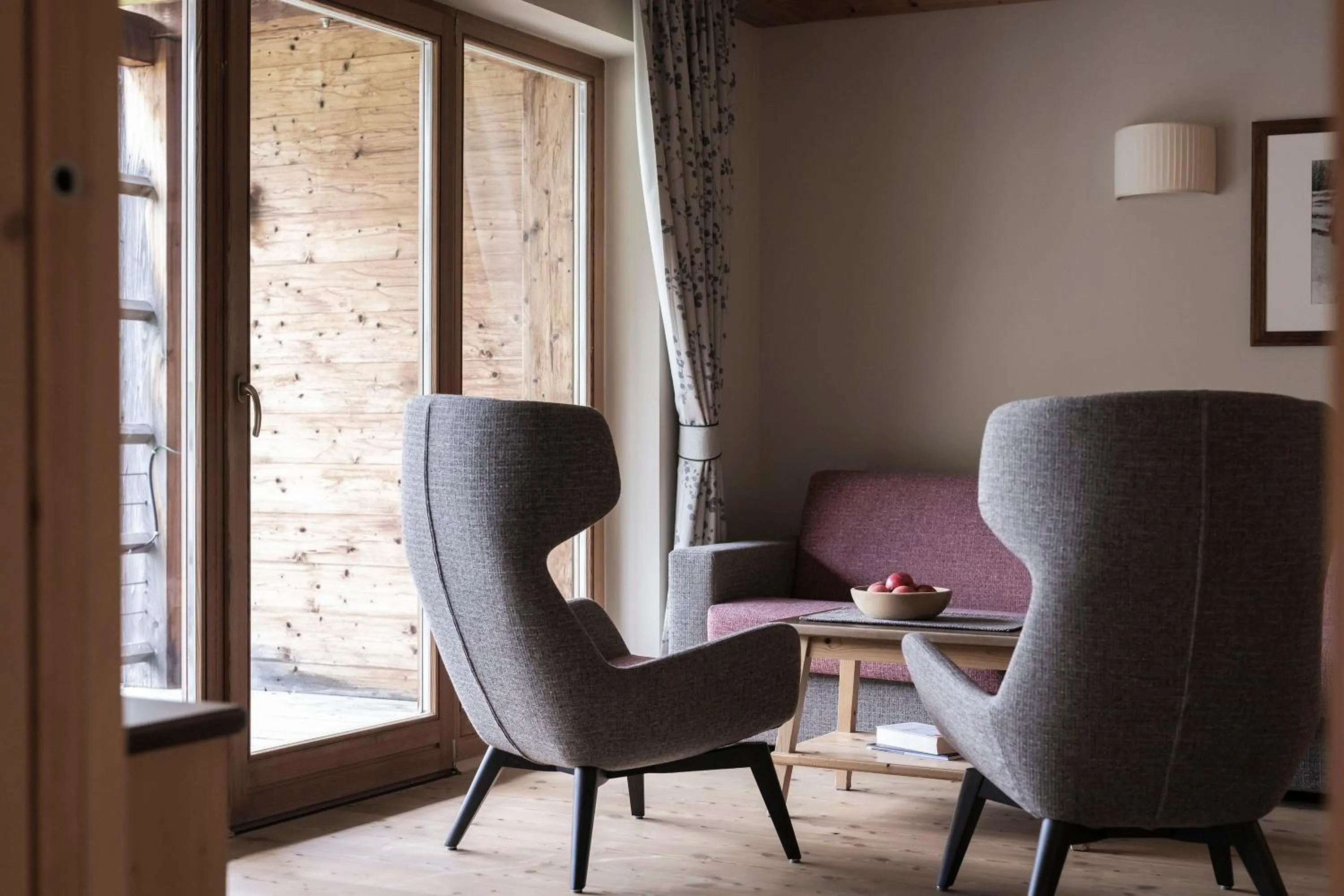 Living room in Post Alpina - Family Mountain Chalets