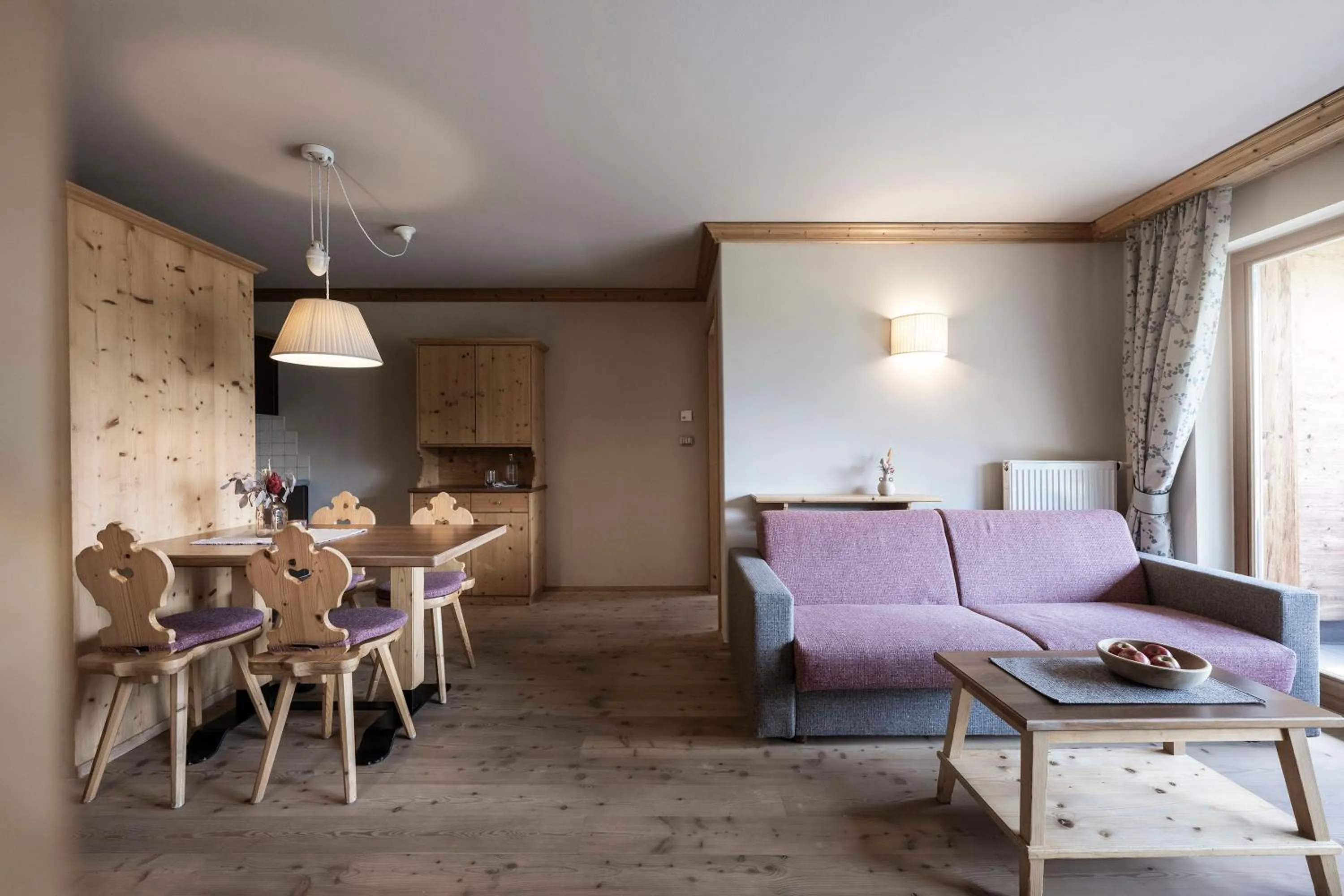Living room in Post Alpina - Family Mountain Chalets