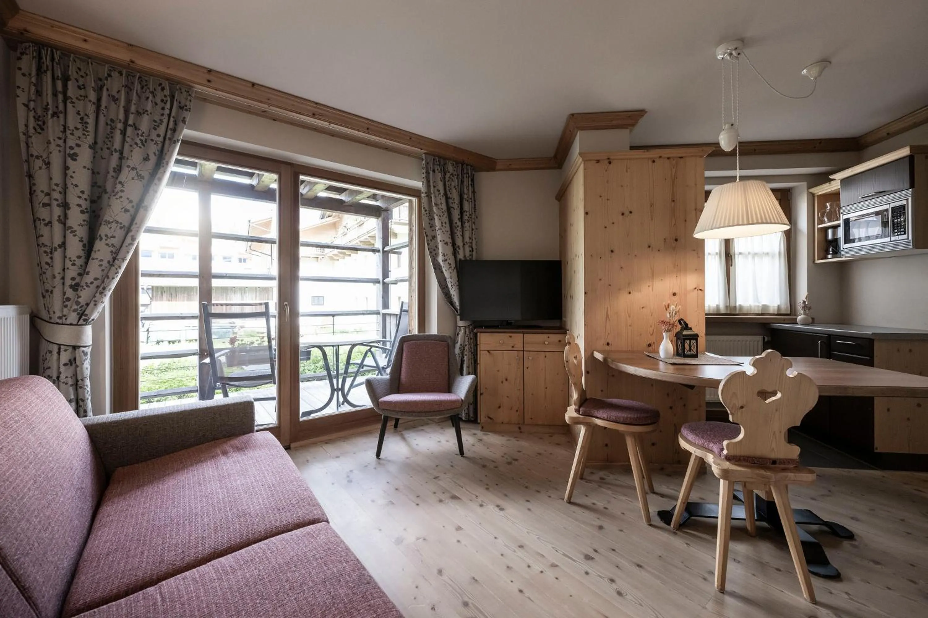 Living room in Post Alpina - Family Mountain Chalets