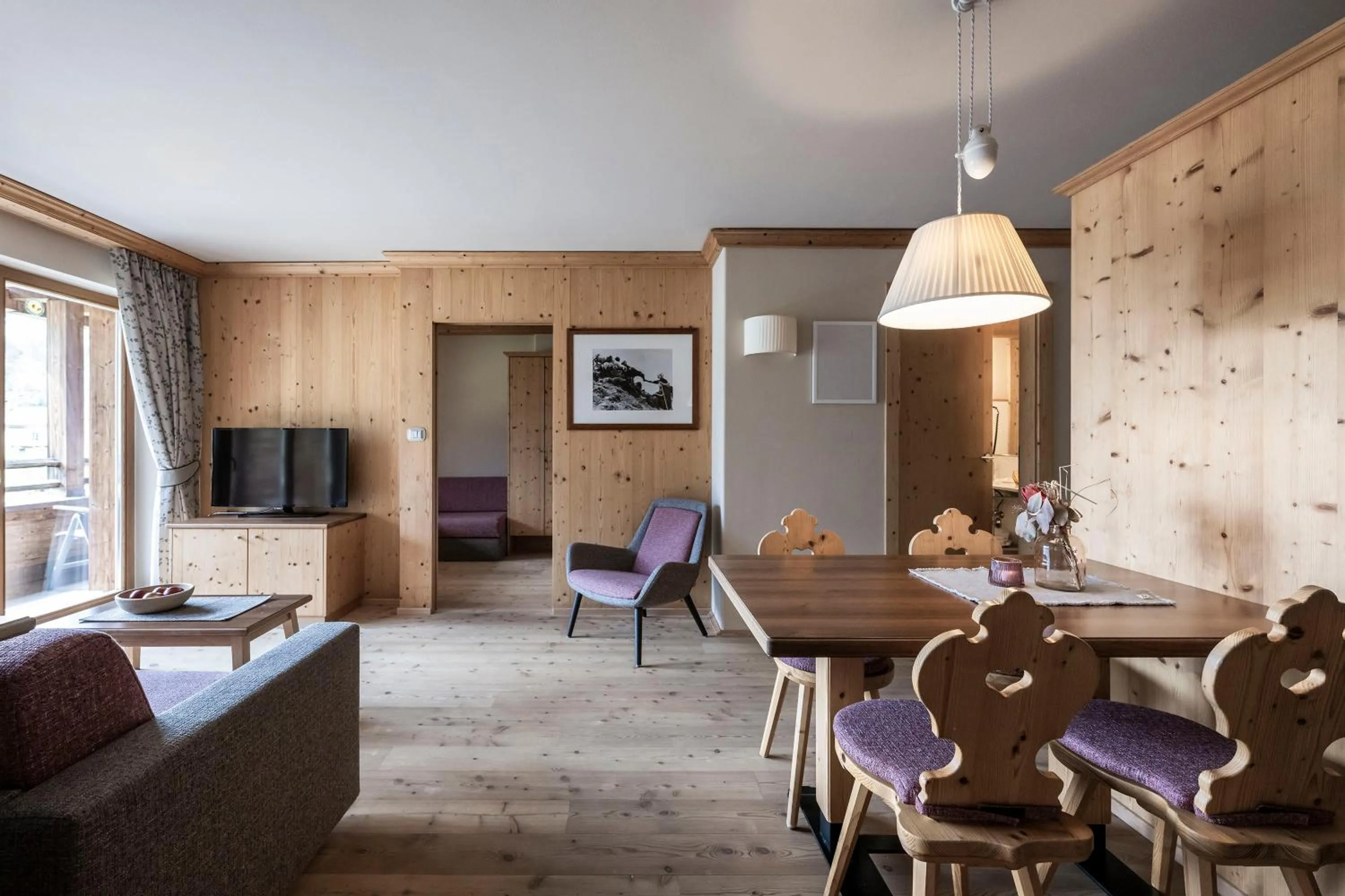 Living room in Post Alpina - Family Mountain Chalets