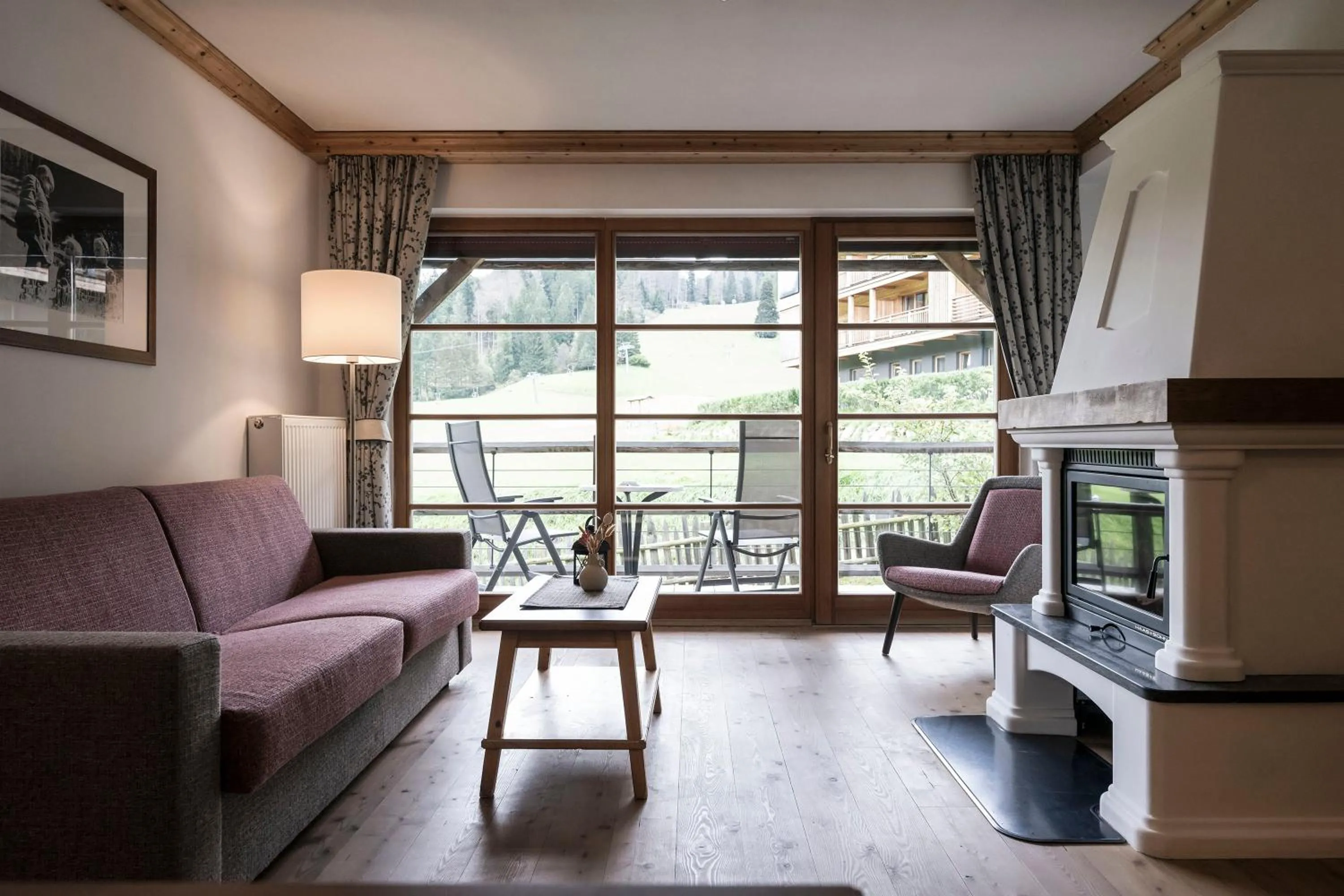 Living room in Post Alpina - Family Mountain Chalets