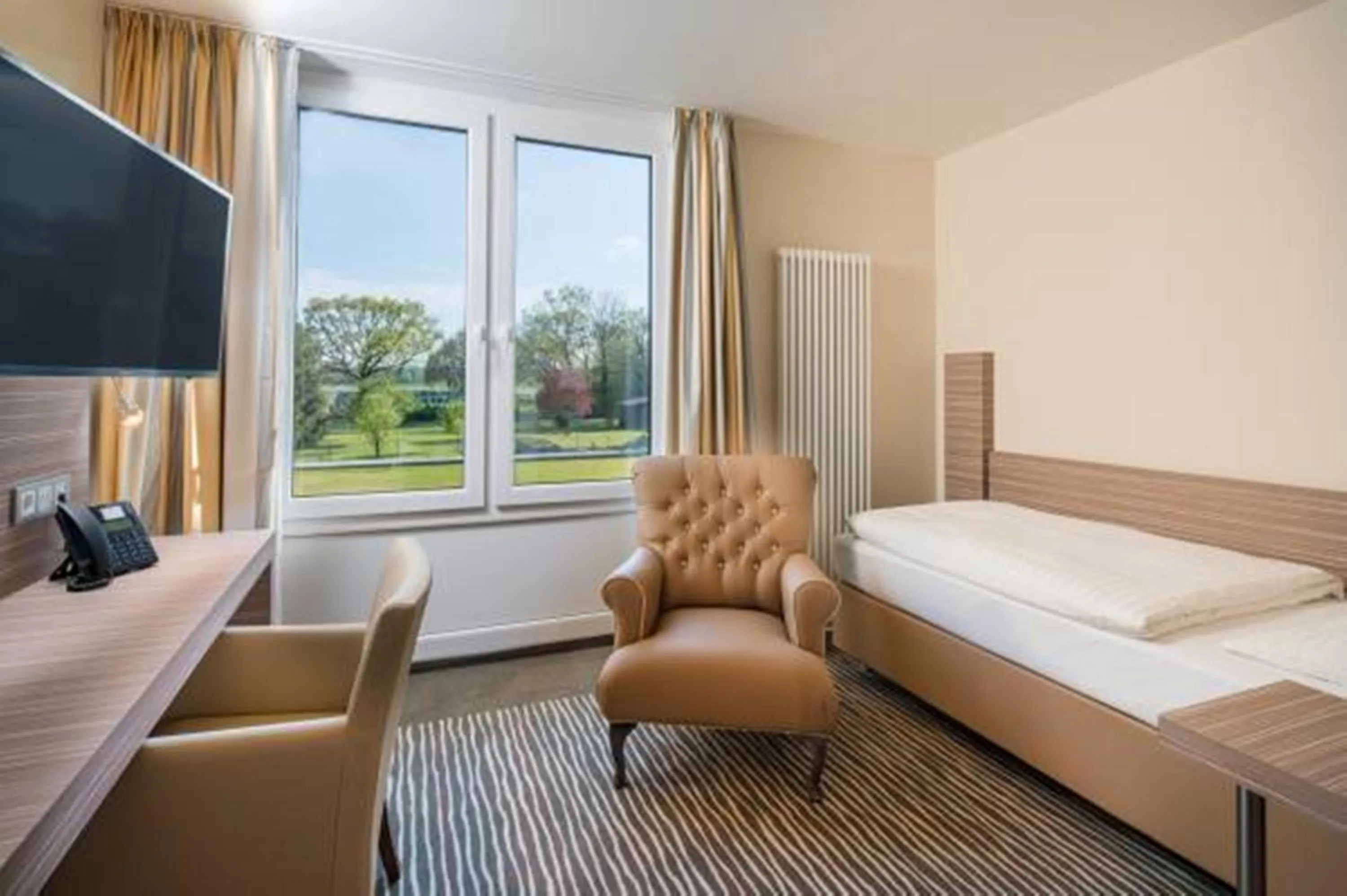 Bed in Balland's Hotel & Restaurant