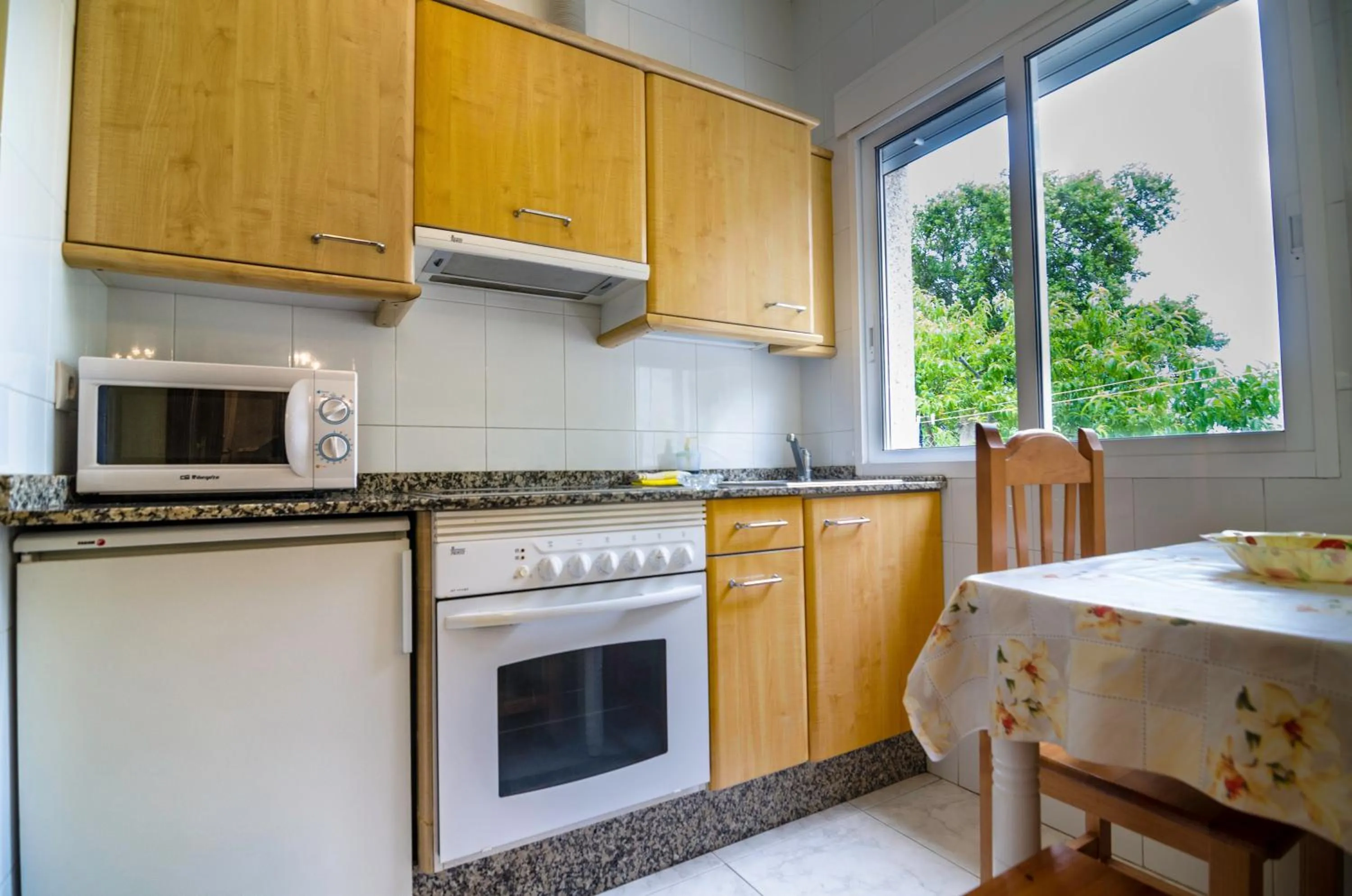 Kitchen or kitchenette in Hotel & Apartamentos Cons da Garda
