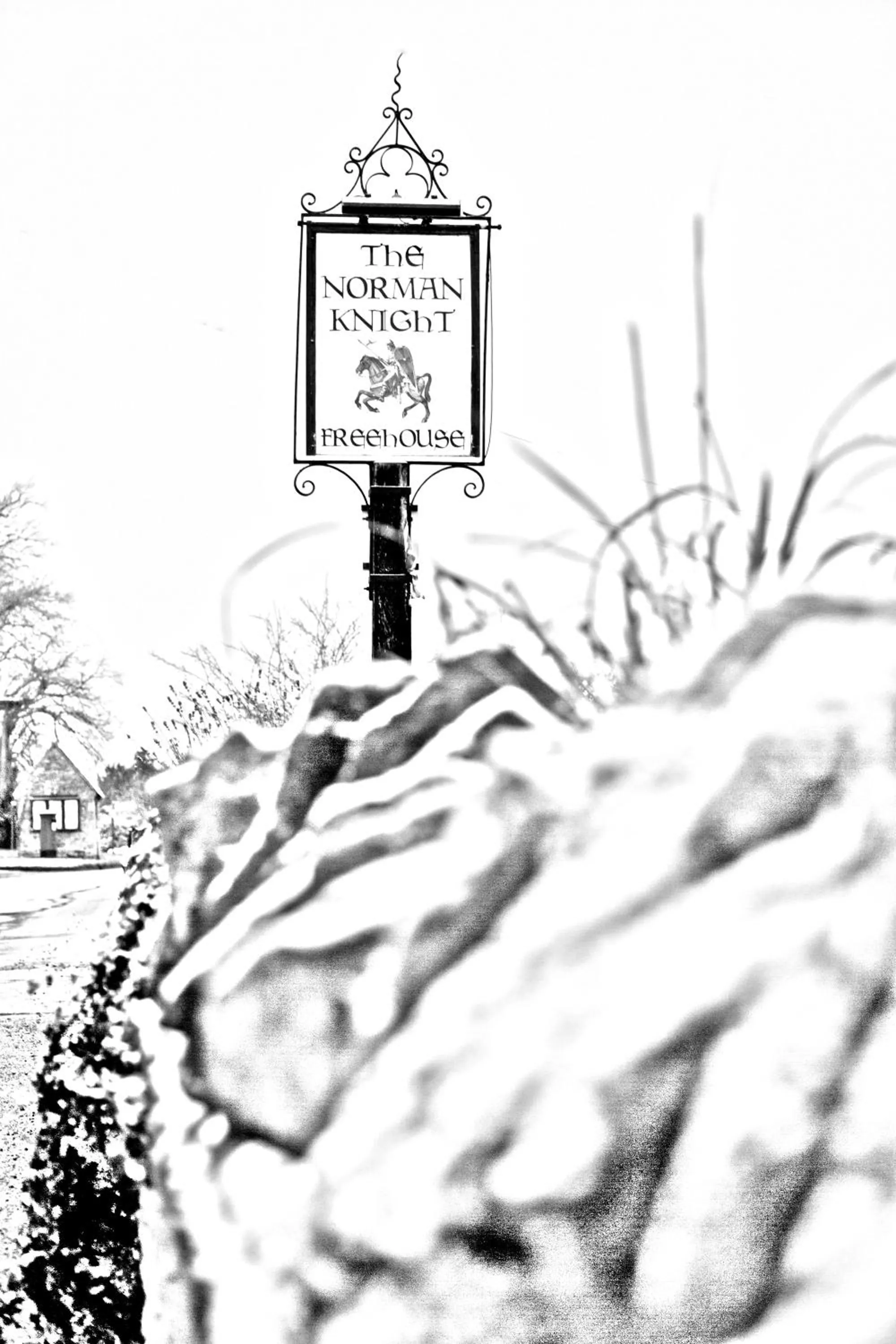 Property logo or sign in The Norman Knight Whichford