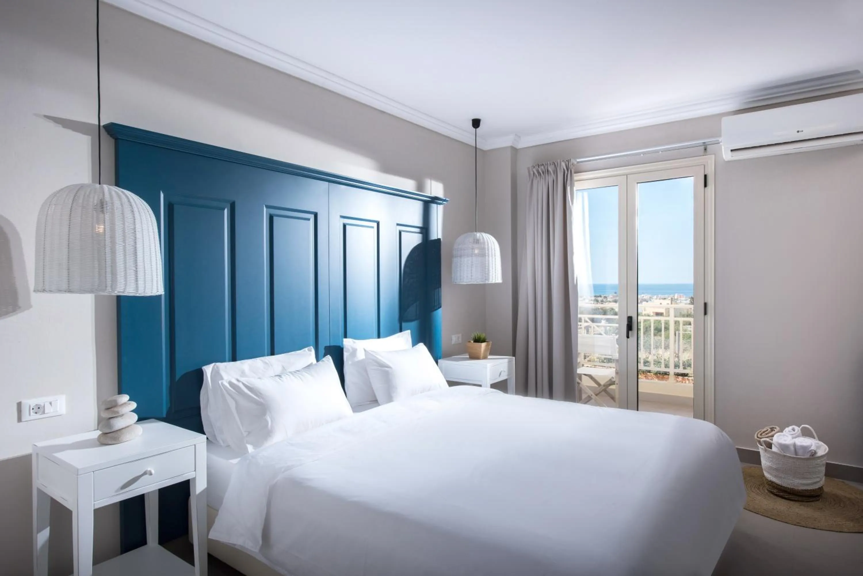 Bed in Notos Heights Hotel & Suites