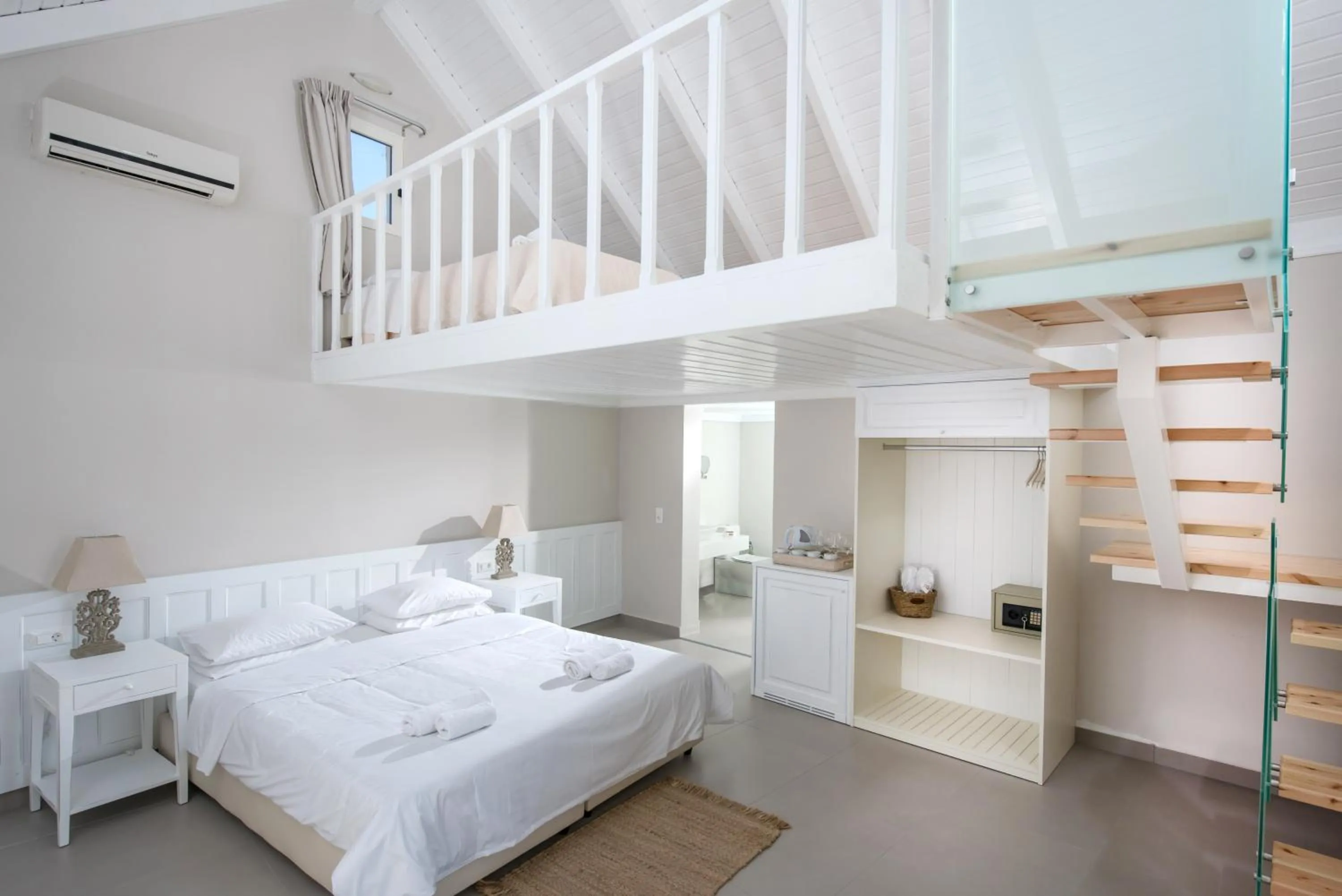 Bed in Notos Heights Hotel & Suites