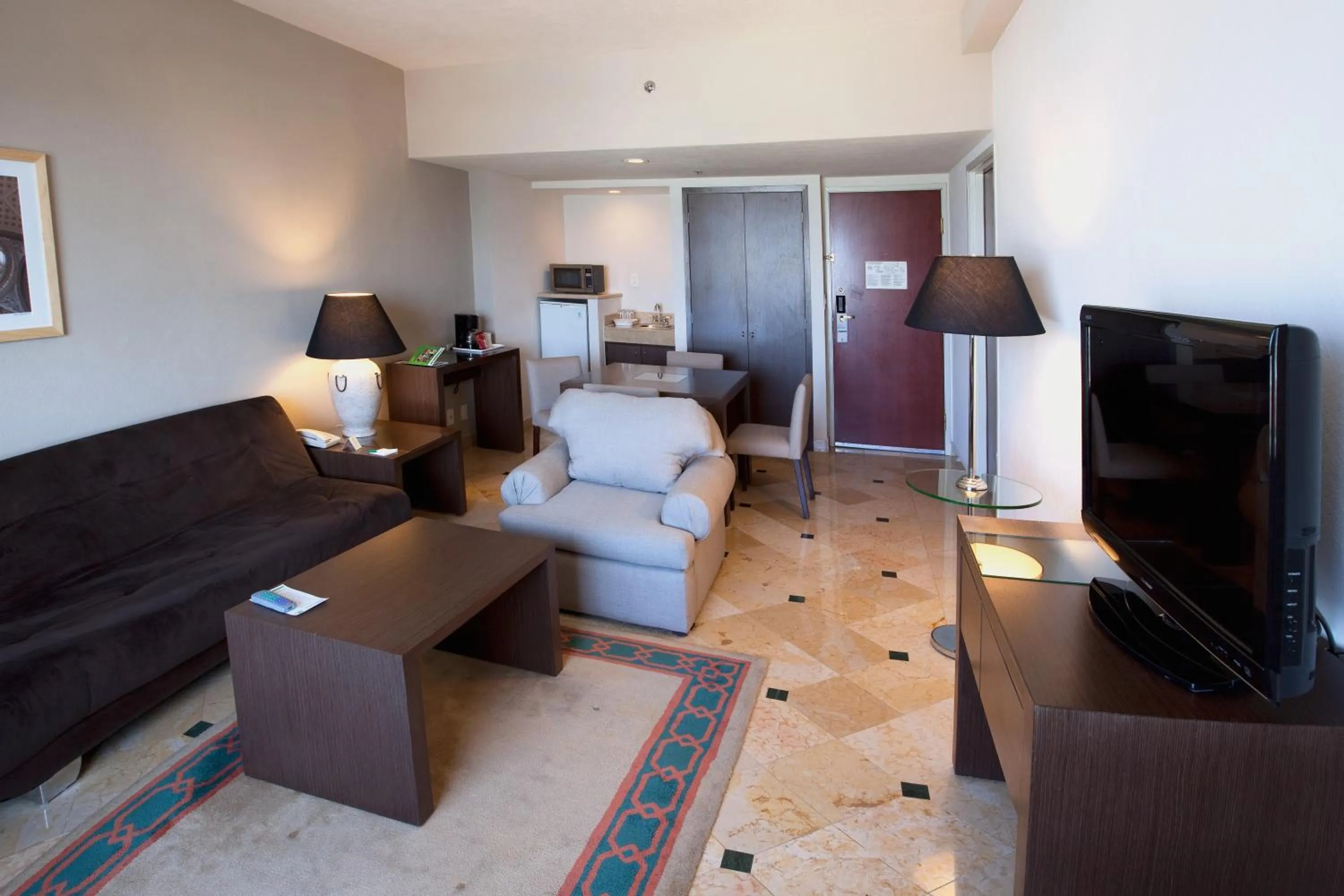 Living room in Holiday Inn Puebla La Noria by IHG