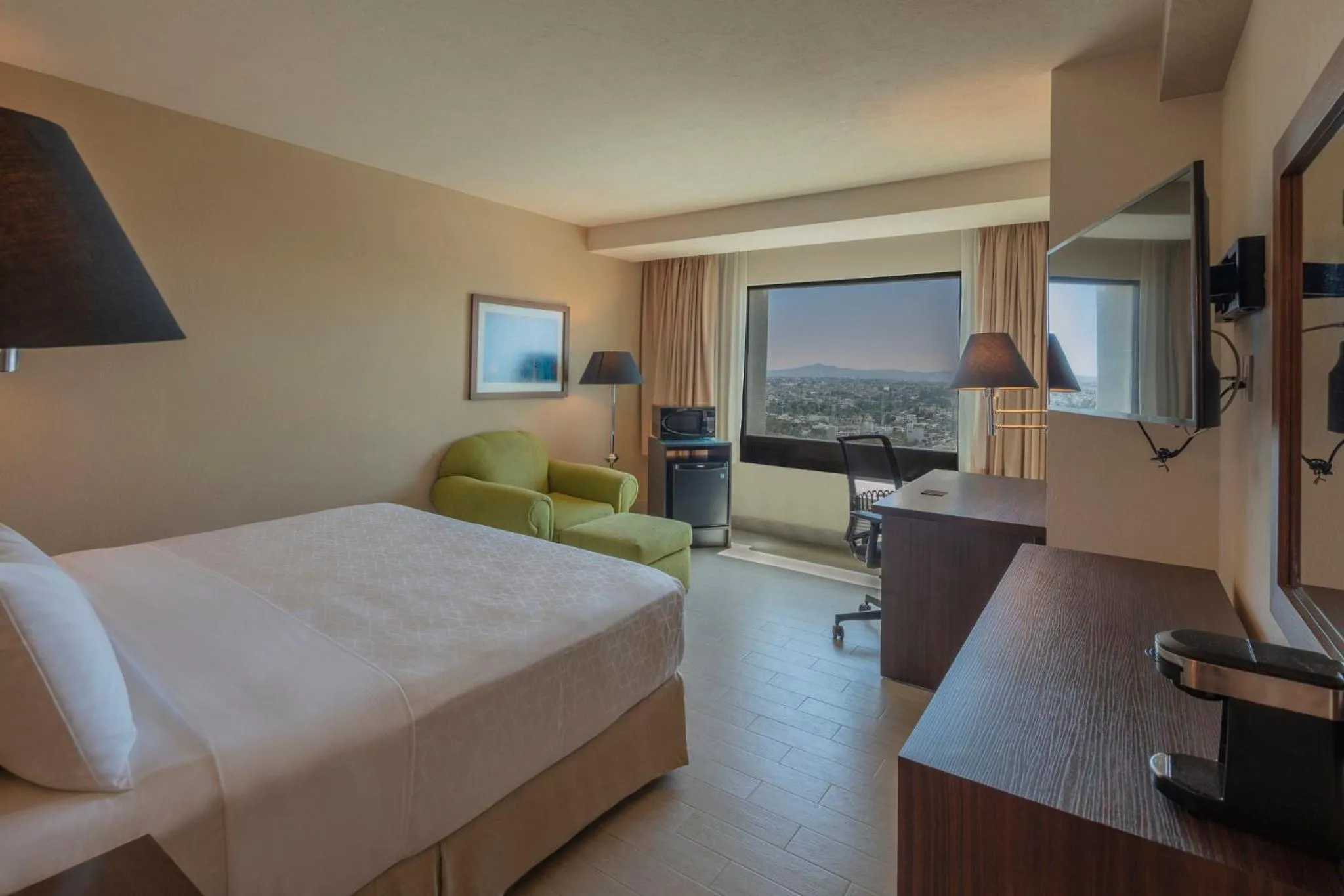 Photo of the whole room, Bed in Holiday Inn Puebla La Noria by IHG