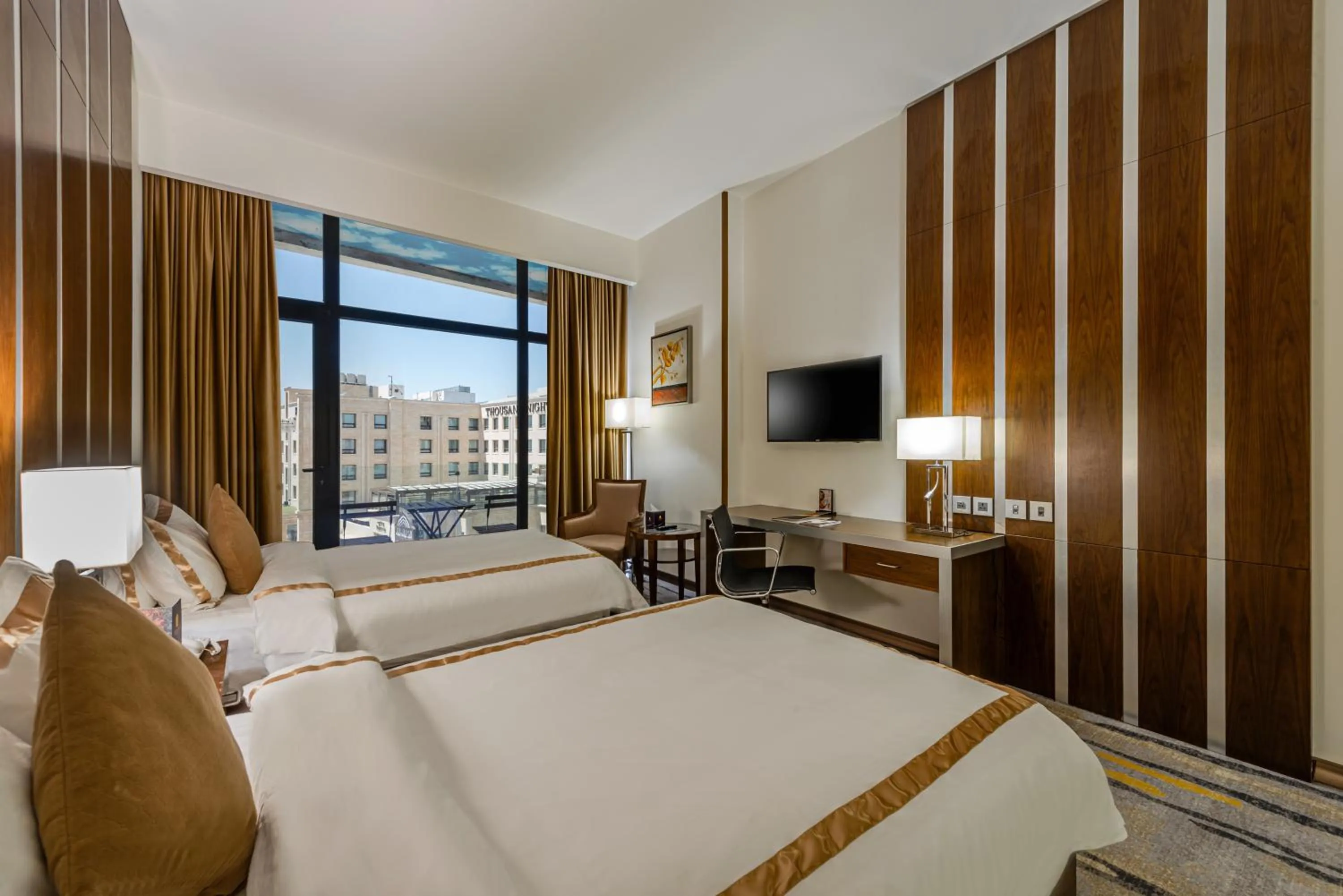 Bed in Sulaf Luxury Hotel