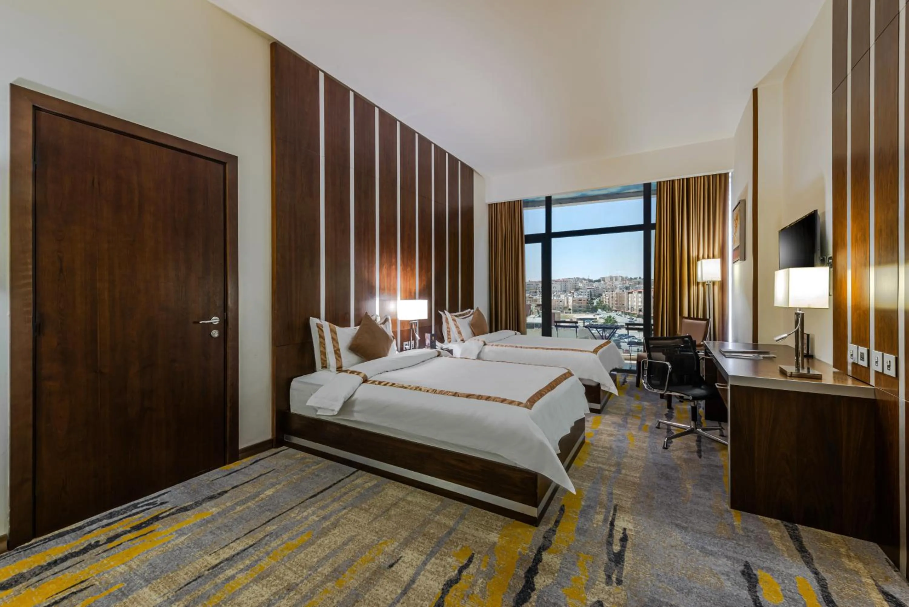 Bed in Sulaf Luxury Hotel