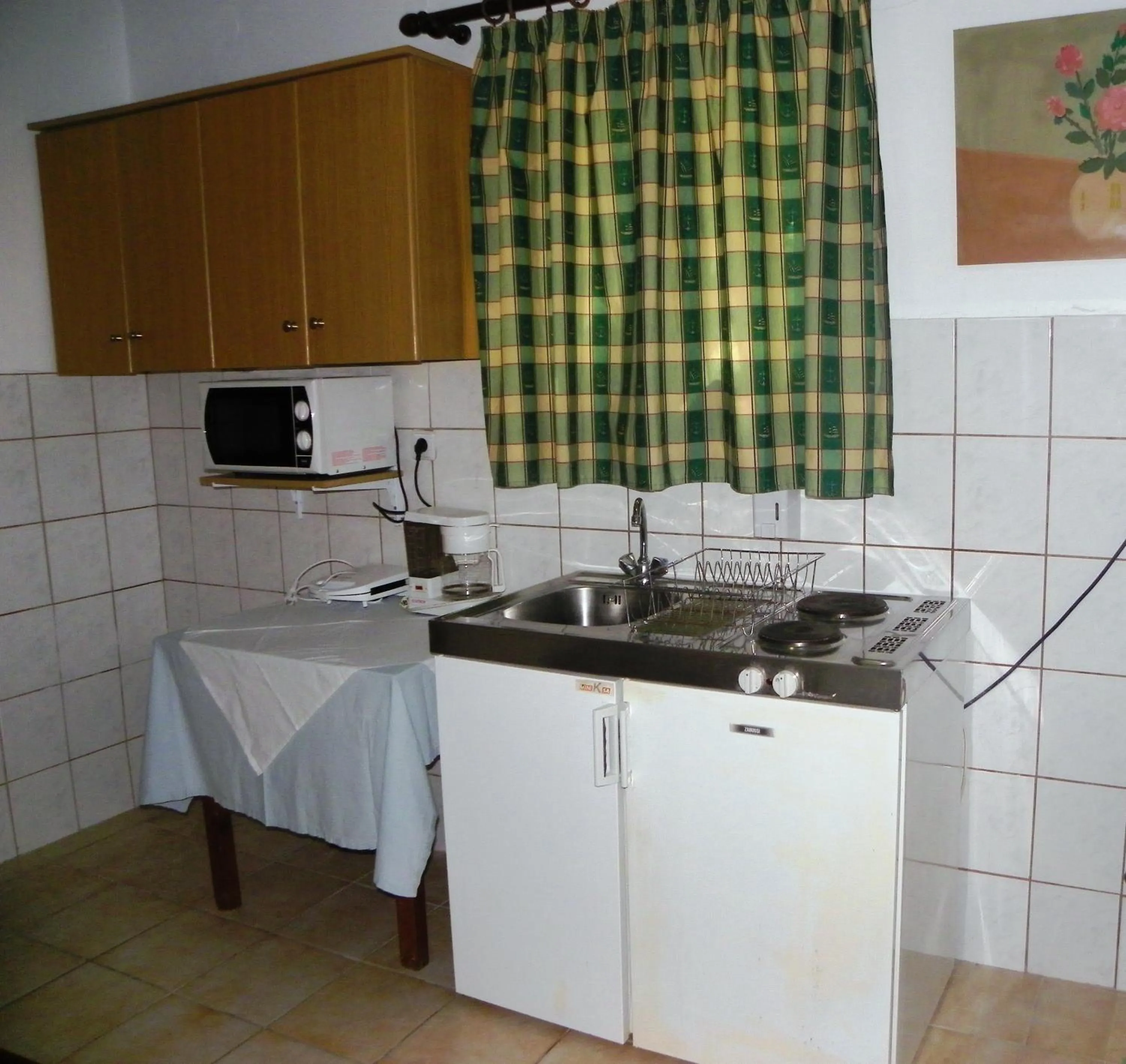Kitchen or kitchenette in Mirabelle Hotel