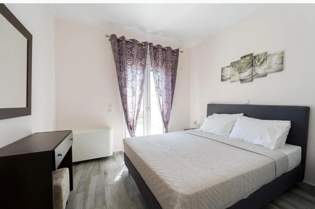 Bed in Diwani Luxury Villas