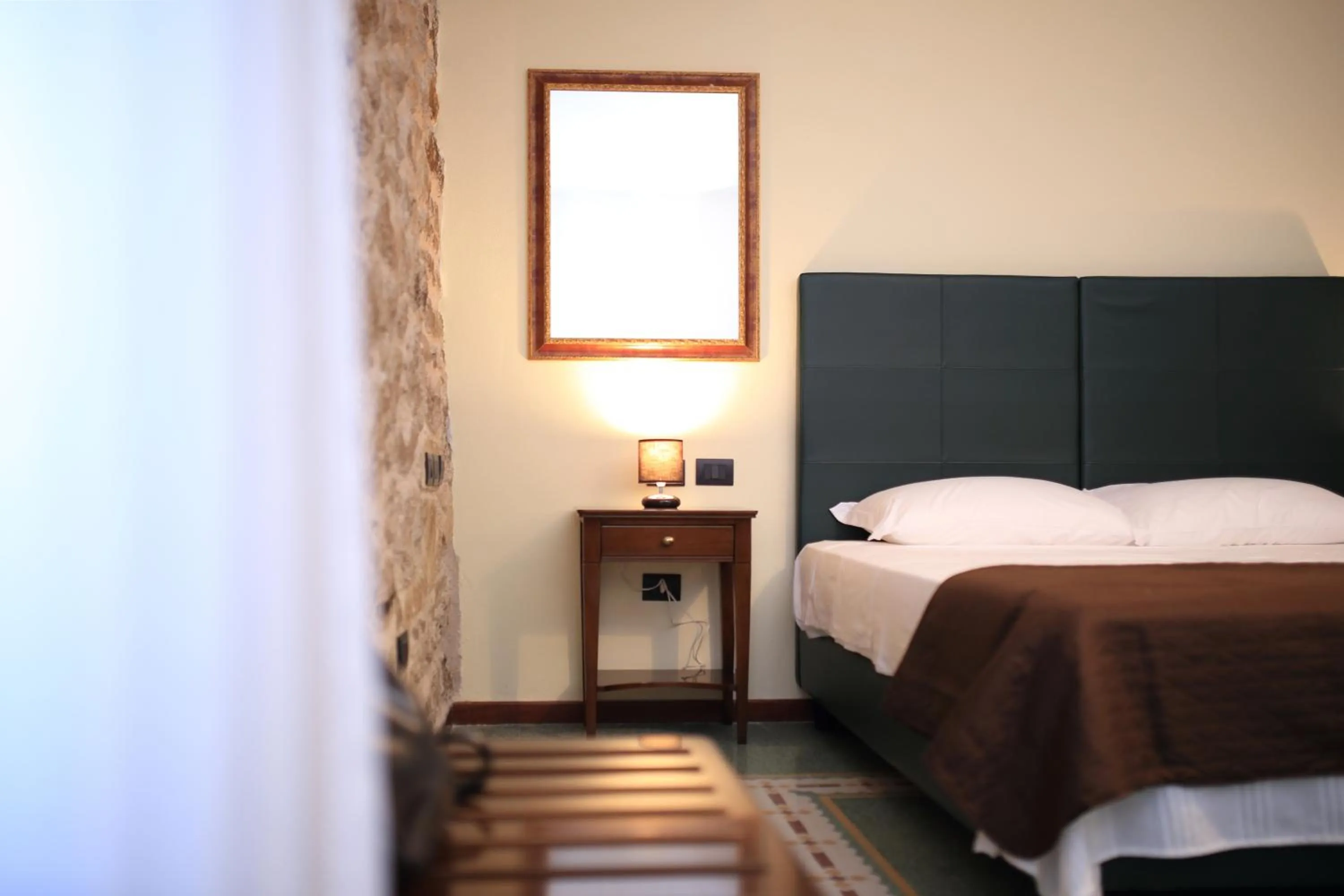 Decorative detail, Bed in Bienestar - Maison de Charme