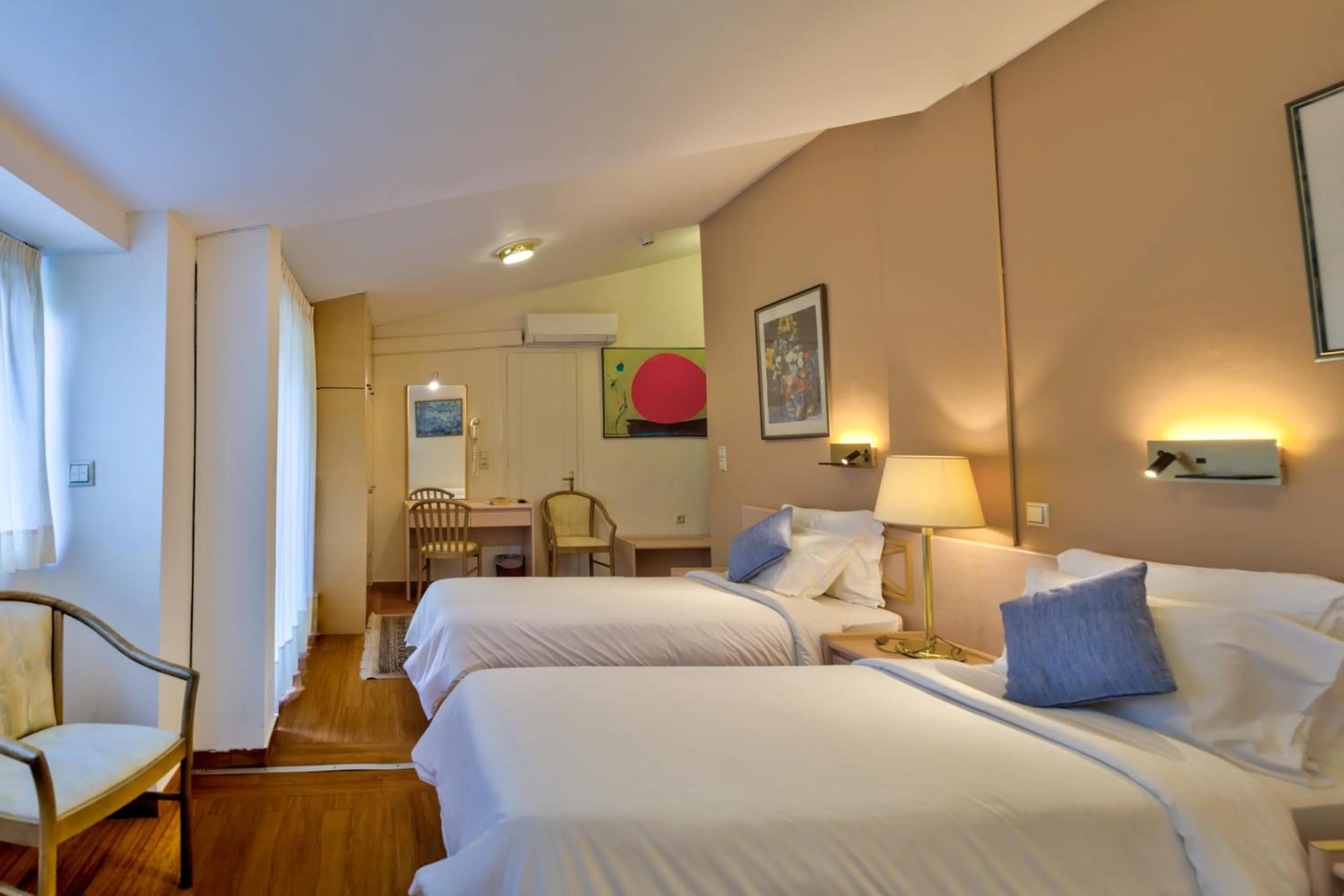 Bed in Poseidon Hotel