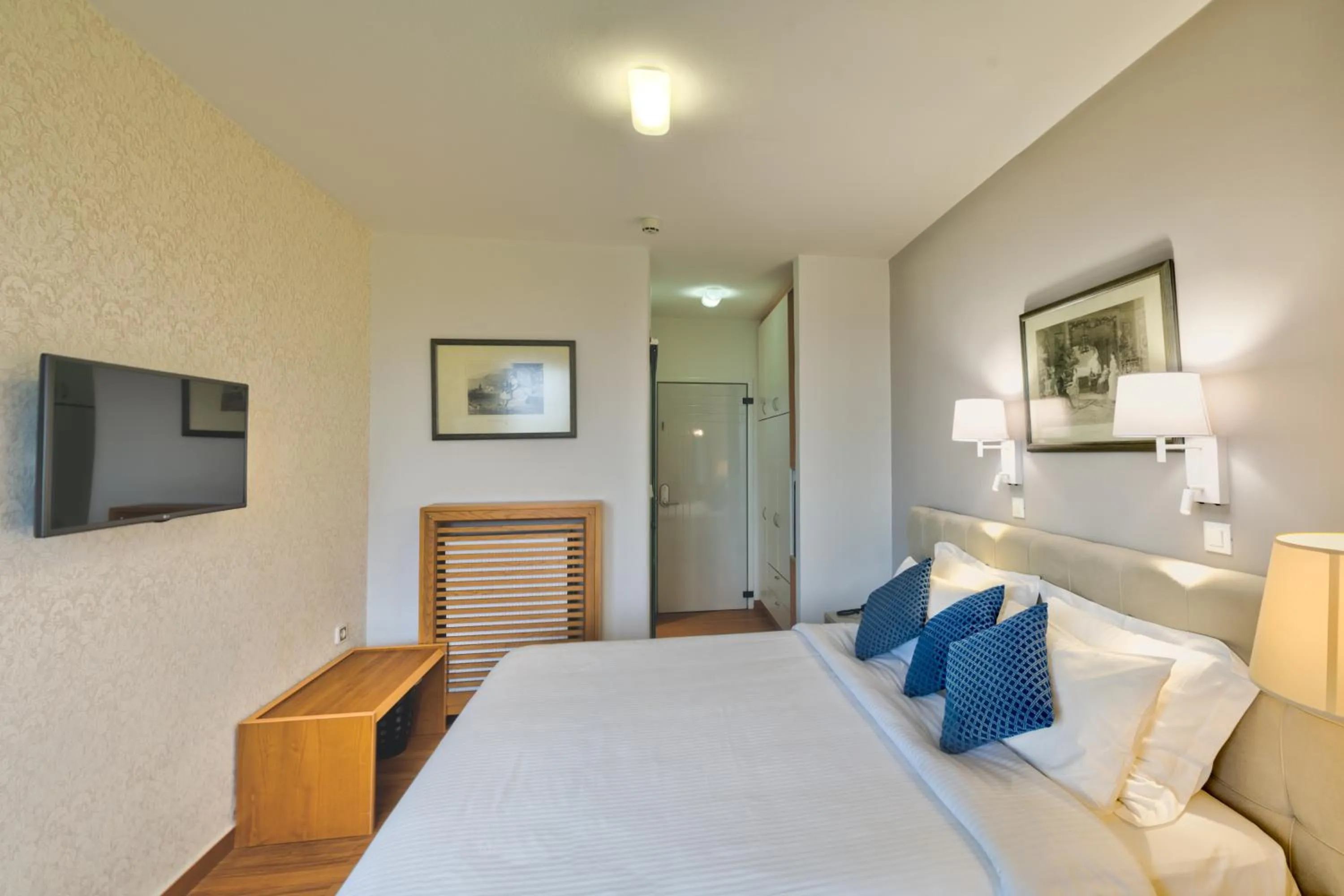 Bed in Poseidon Hotel