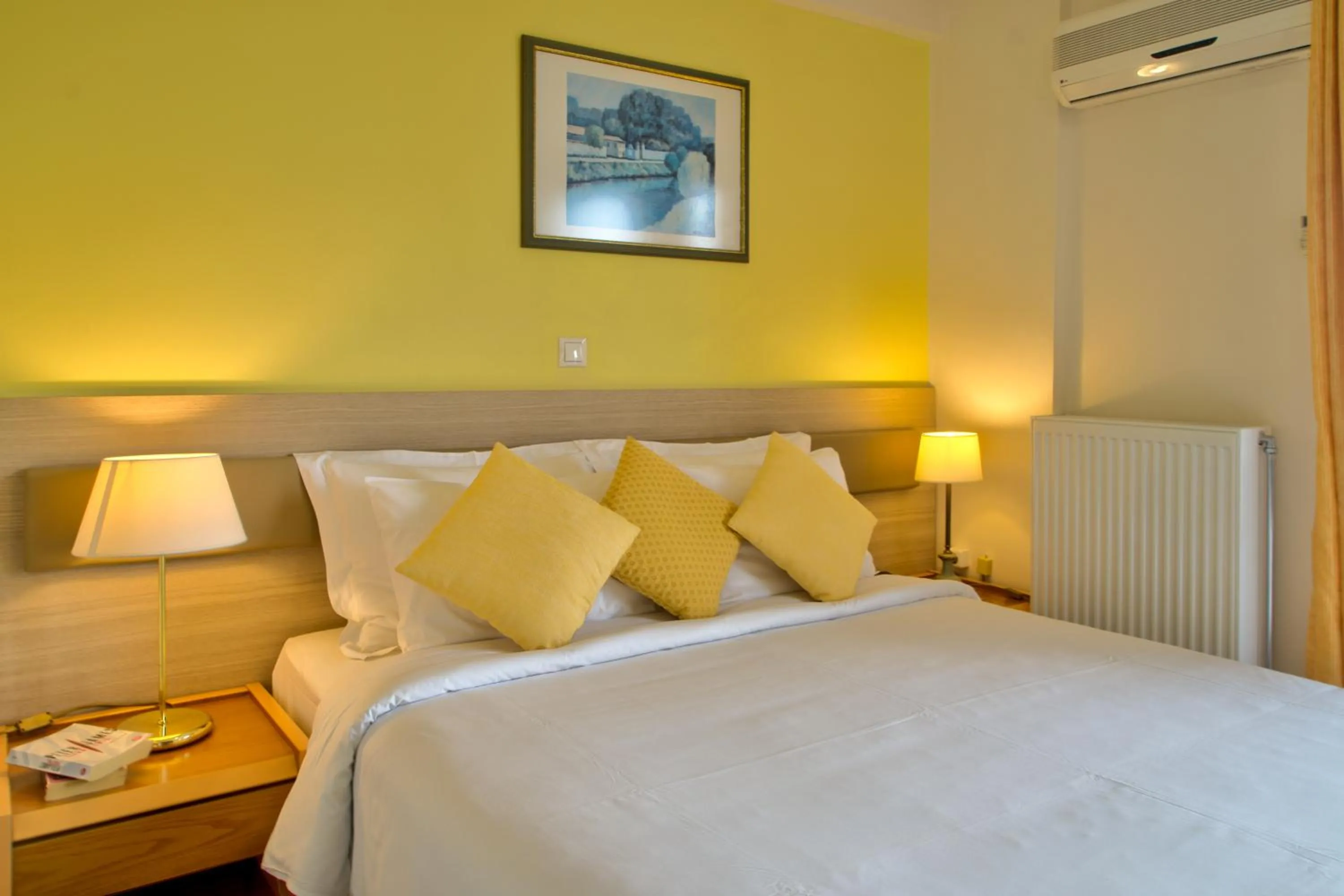 Bed in Poseidon Hotel