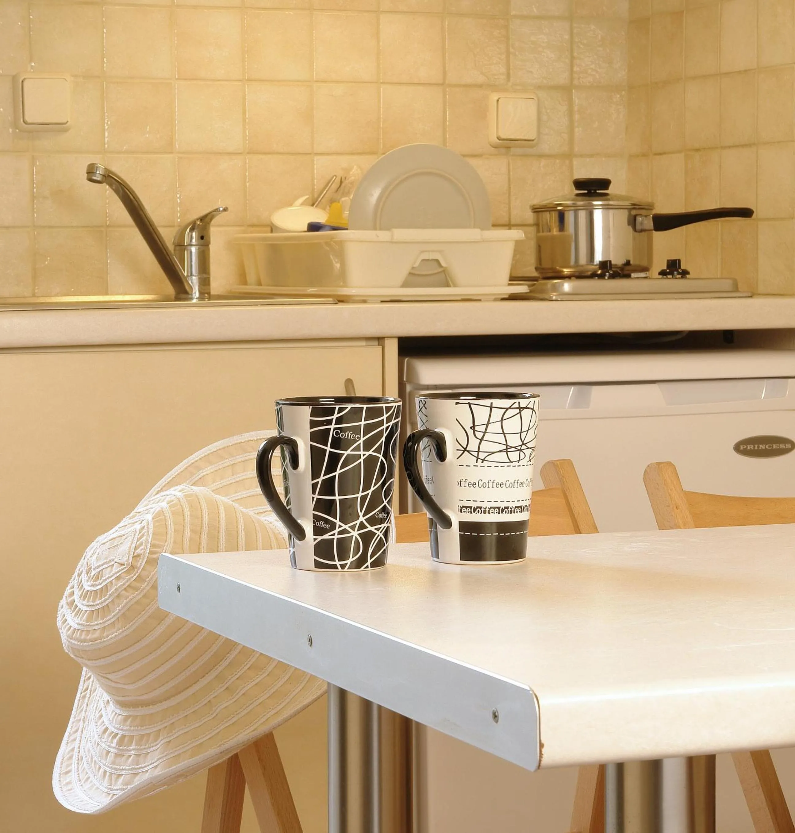 Kitchen or kitchenette in Mirabella Apartments