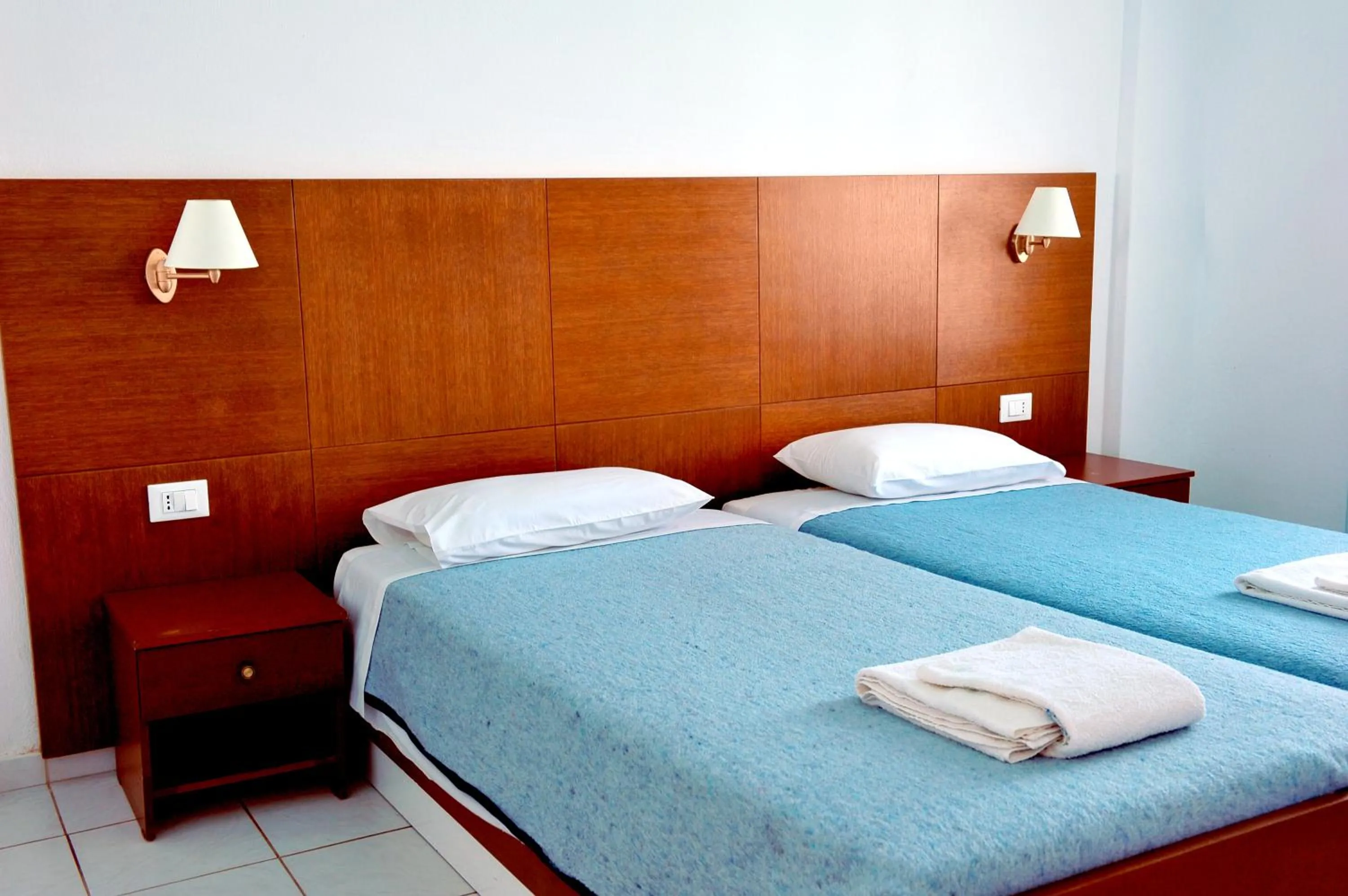 Bed in Mirabella Apartments