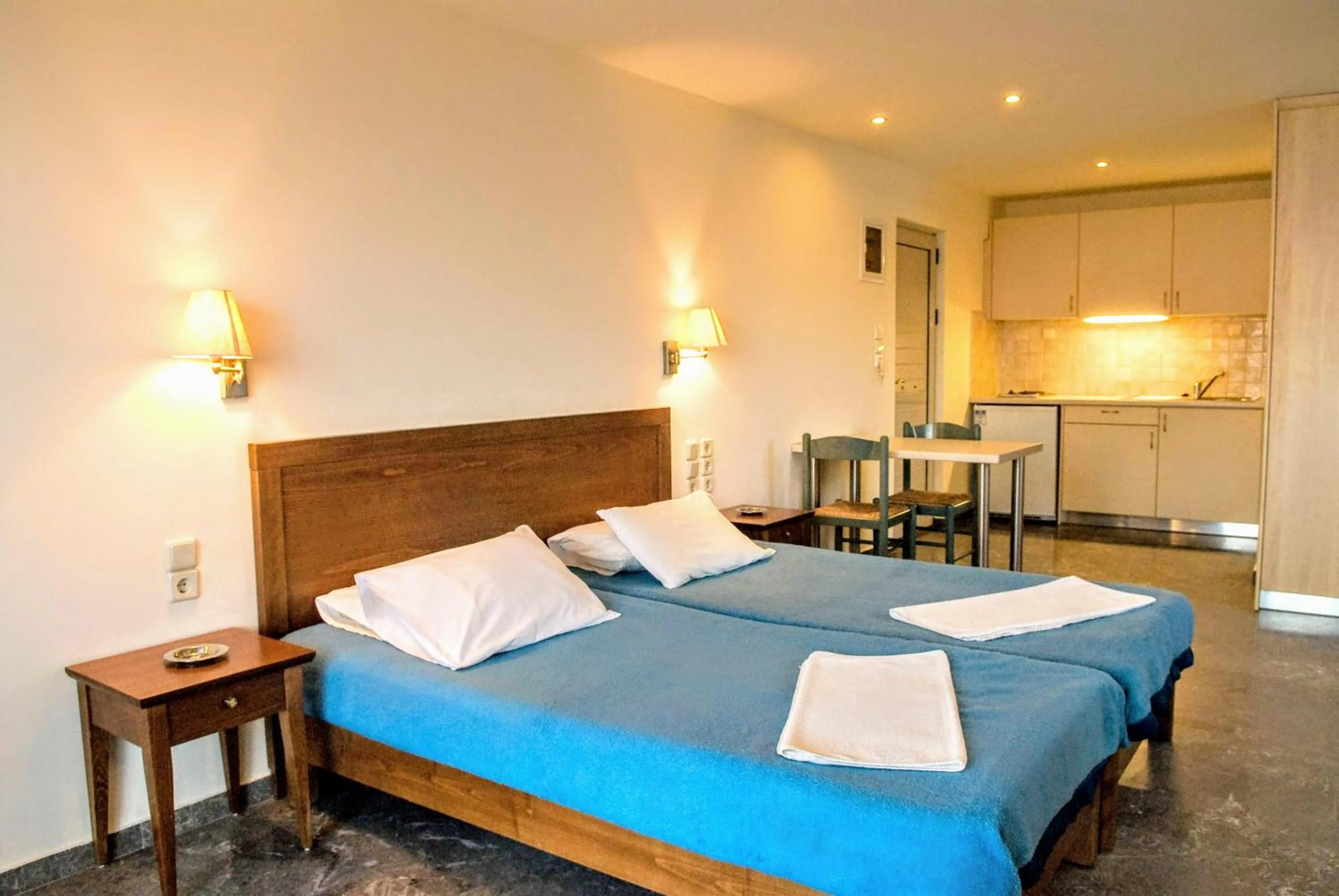 Photo of the whole room, Bed in Mirabella Apartments