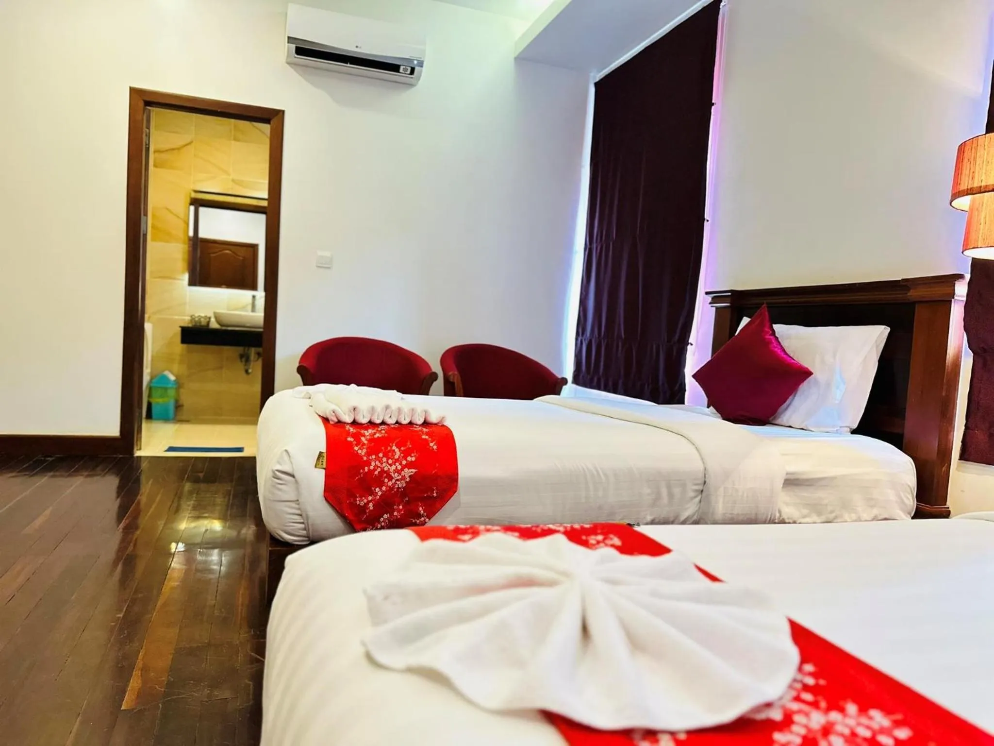 Bed in Holy Angkor Hotel