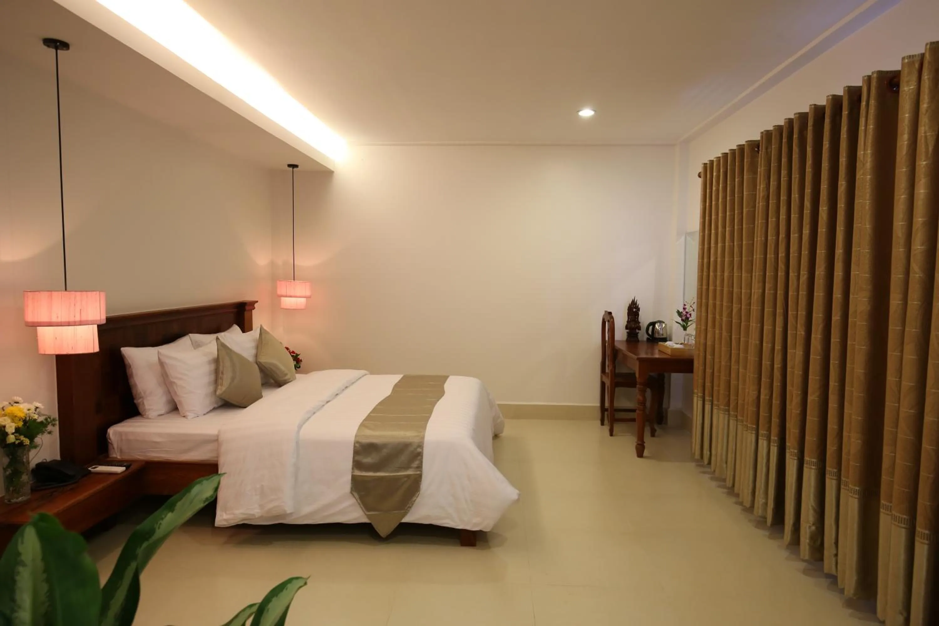 Bed in Holy Angkor Hotel