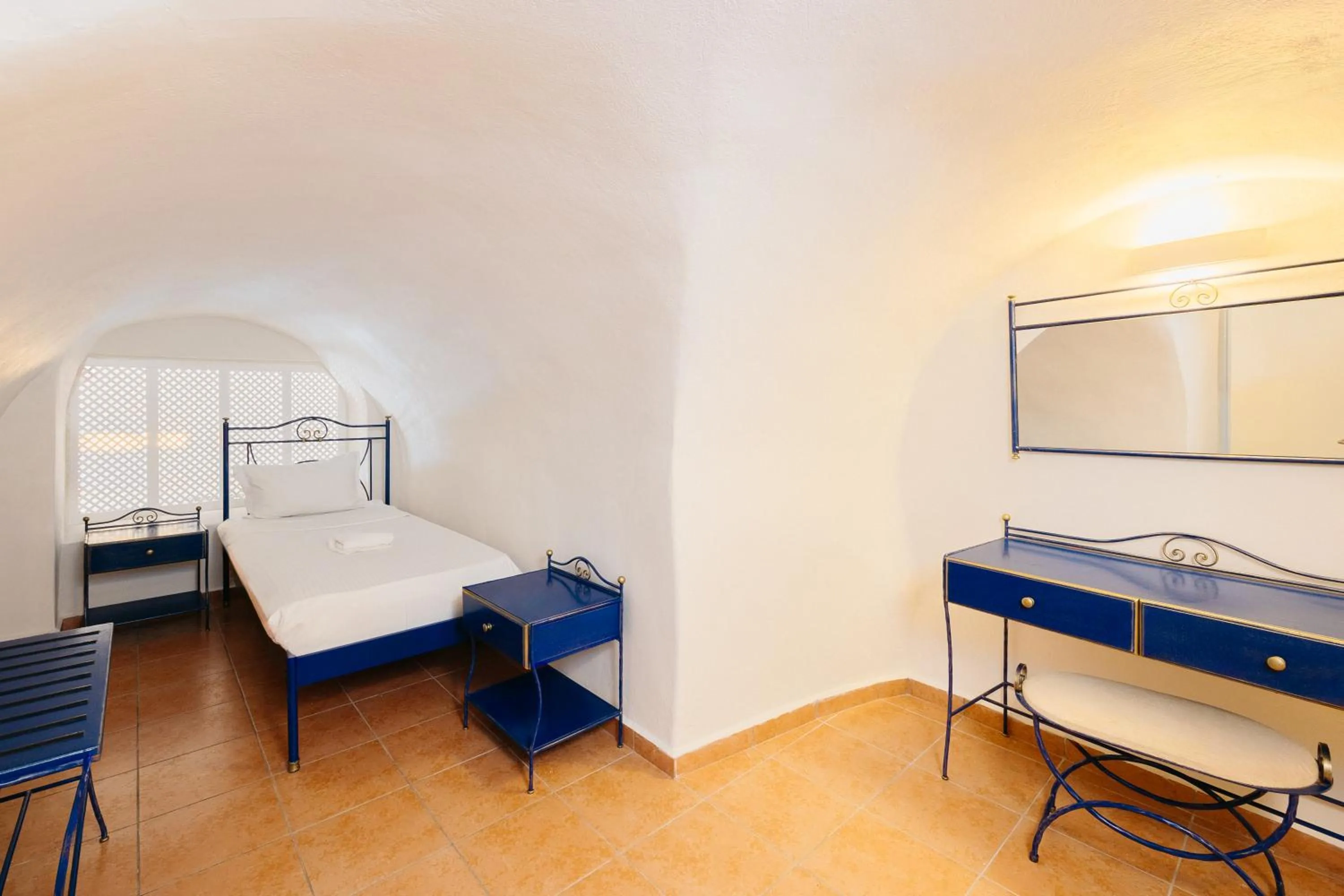 Bed in Kastro Suites