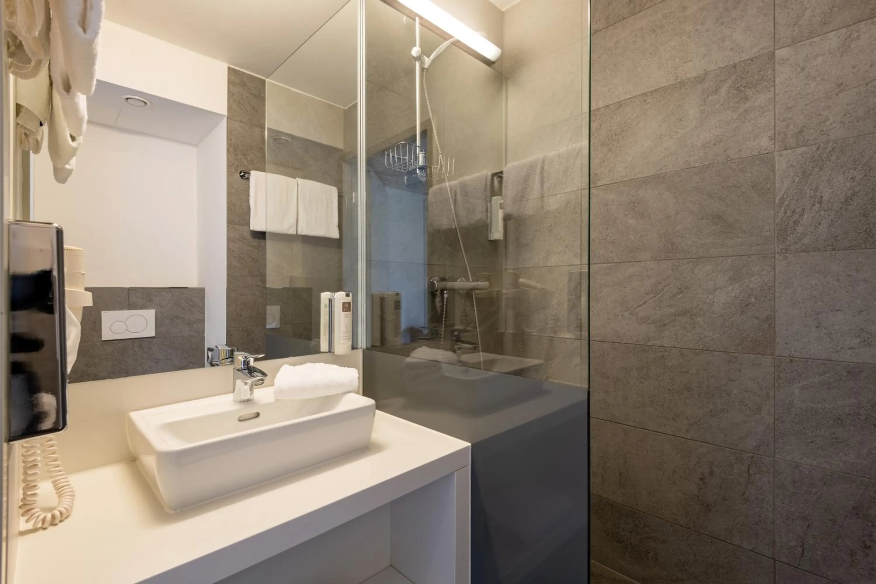 Bathroom in Hwest Hotel