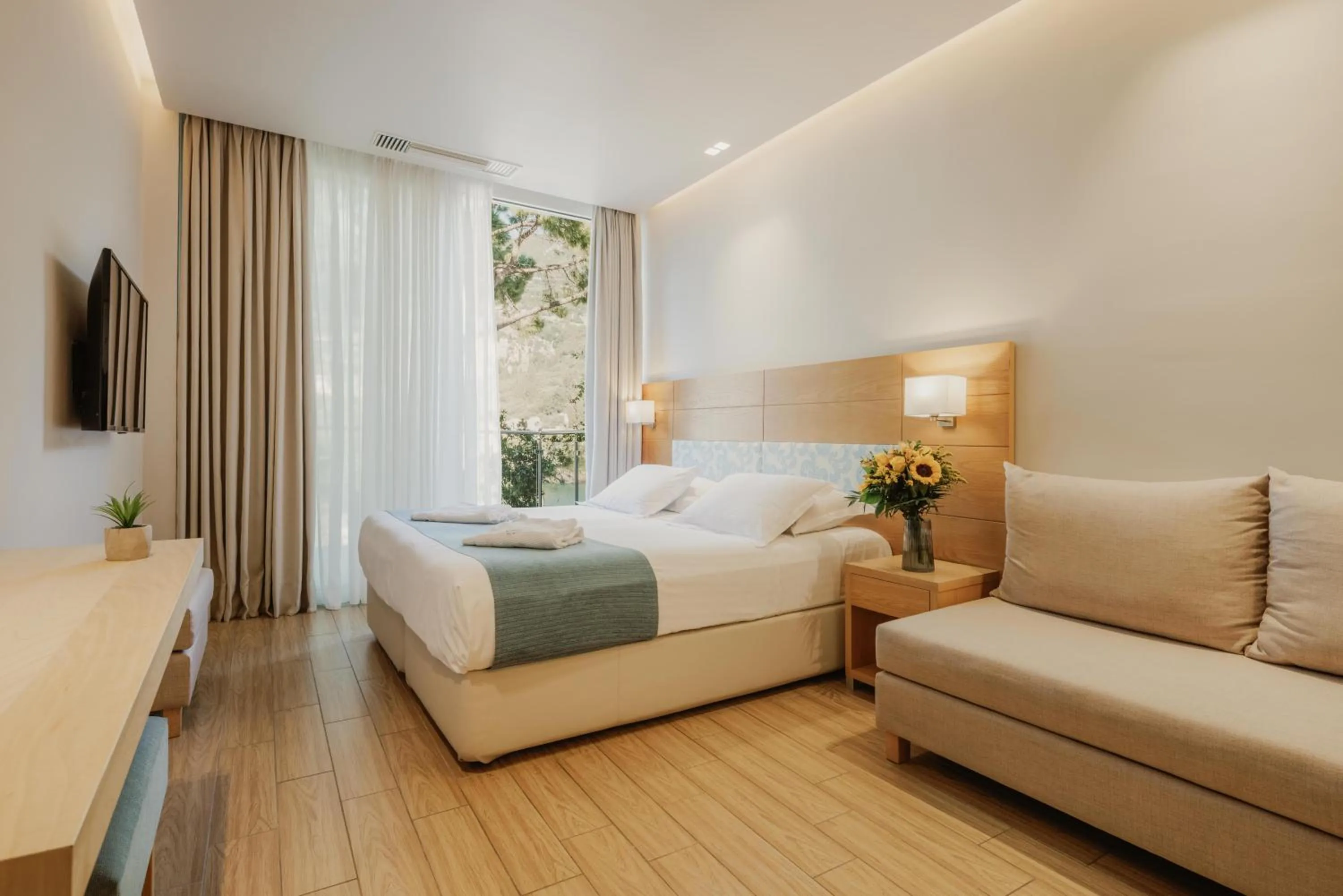 Bedroom, Bed in Akrotiri Beach Resort Hotel - Adult Friendly