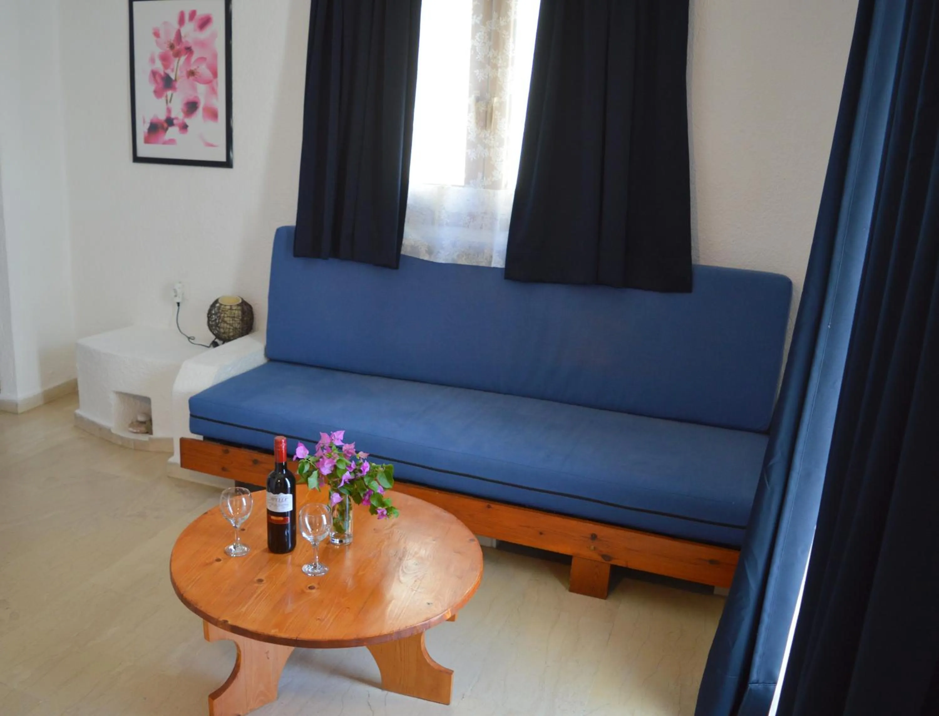 Bed in Mantraki Hotel Apartments