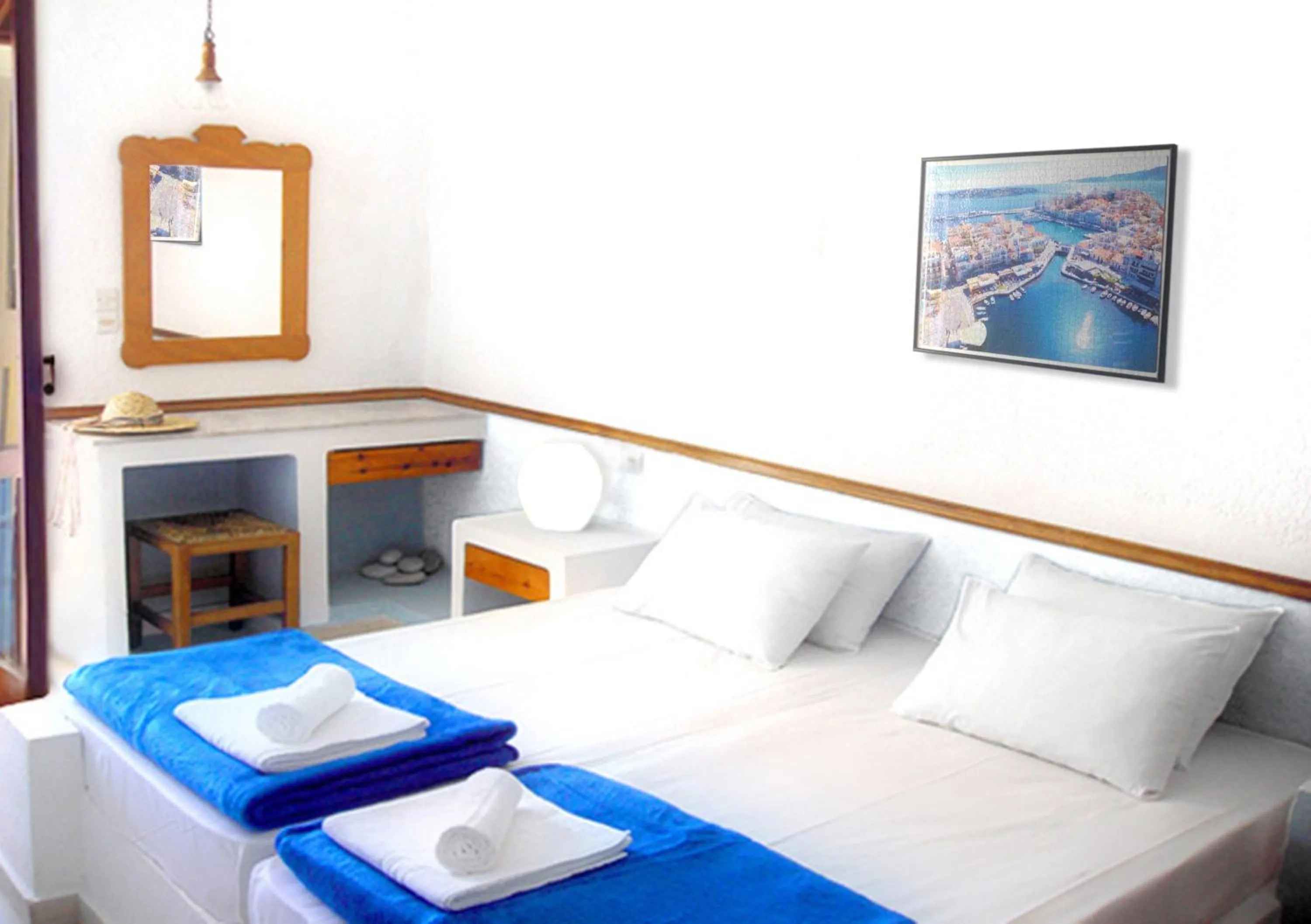 Bed in Mantraki Hotel Apartments