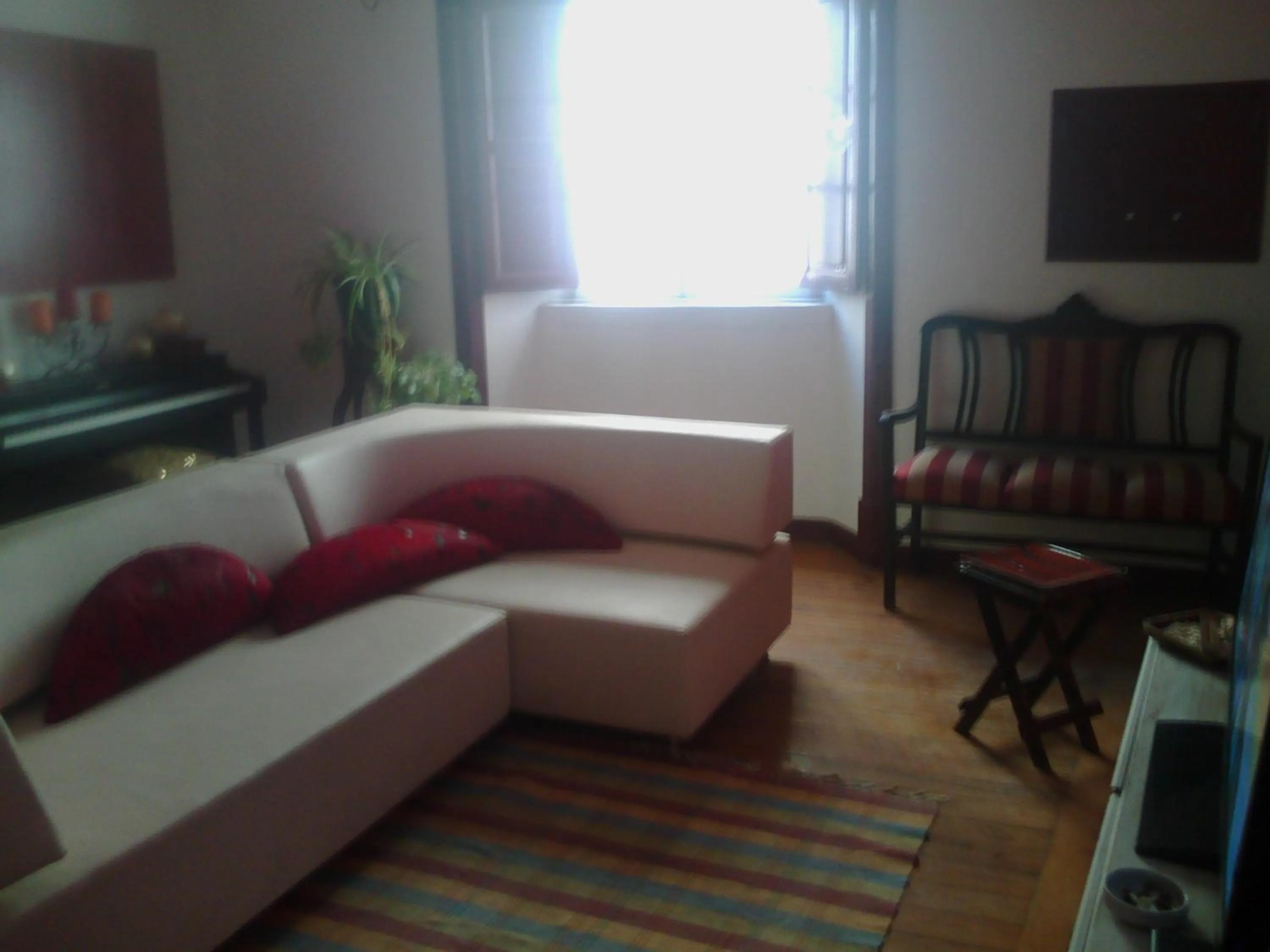 Communal lounge/ TV room in Good Mood Hostel