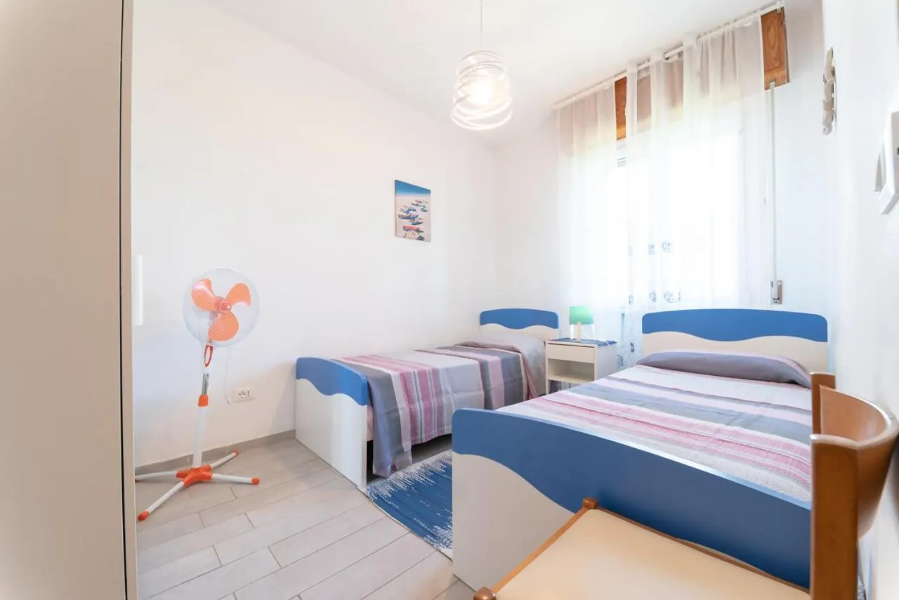 Bed in AZZURRO LIDO ADRIANO VISTA MARE