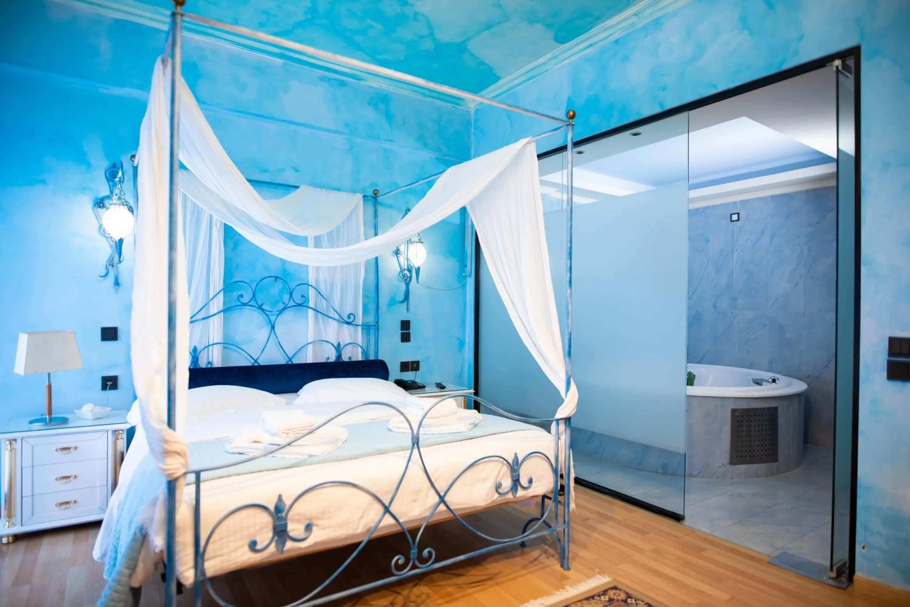 Bed in Anastazia Luxury Suites & Spa