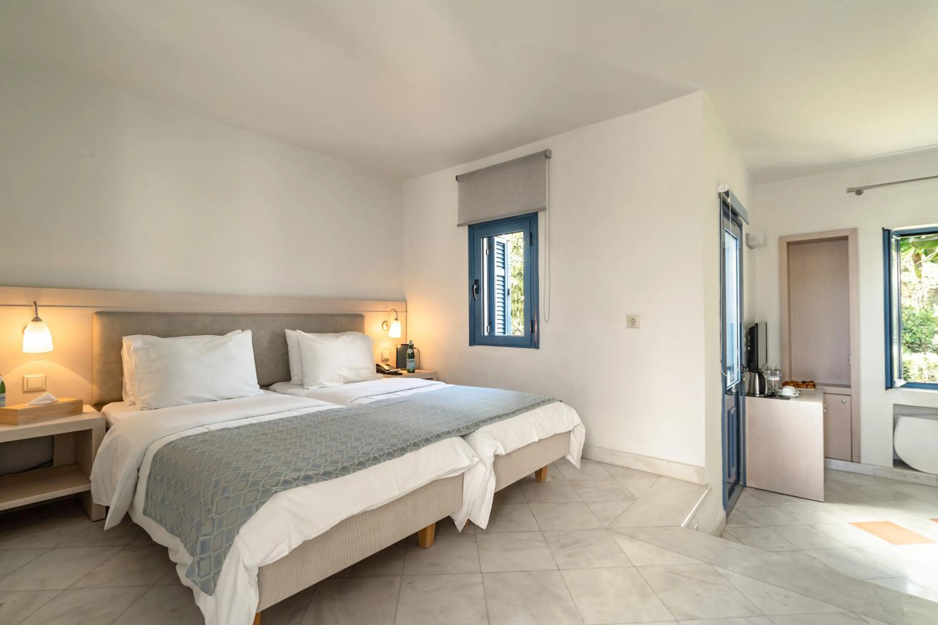Bed in Porto Galini Seaside Resort & Spa