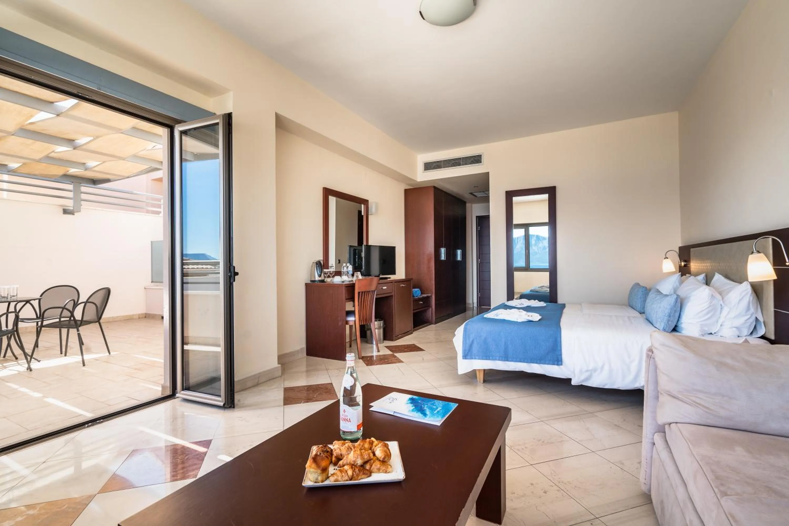 Bed in Porto Galini Seaside Resort & Spa