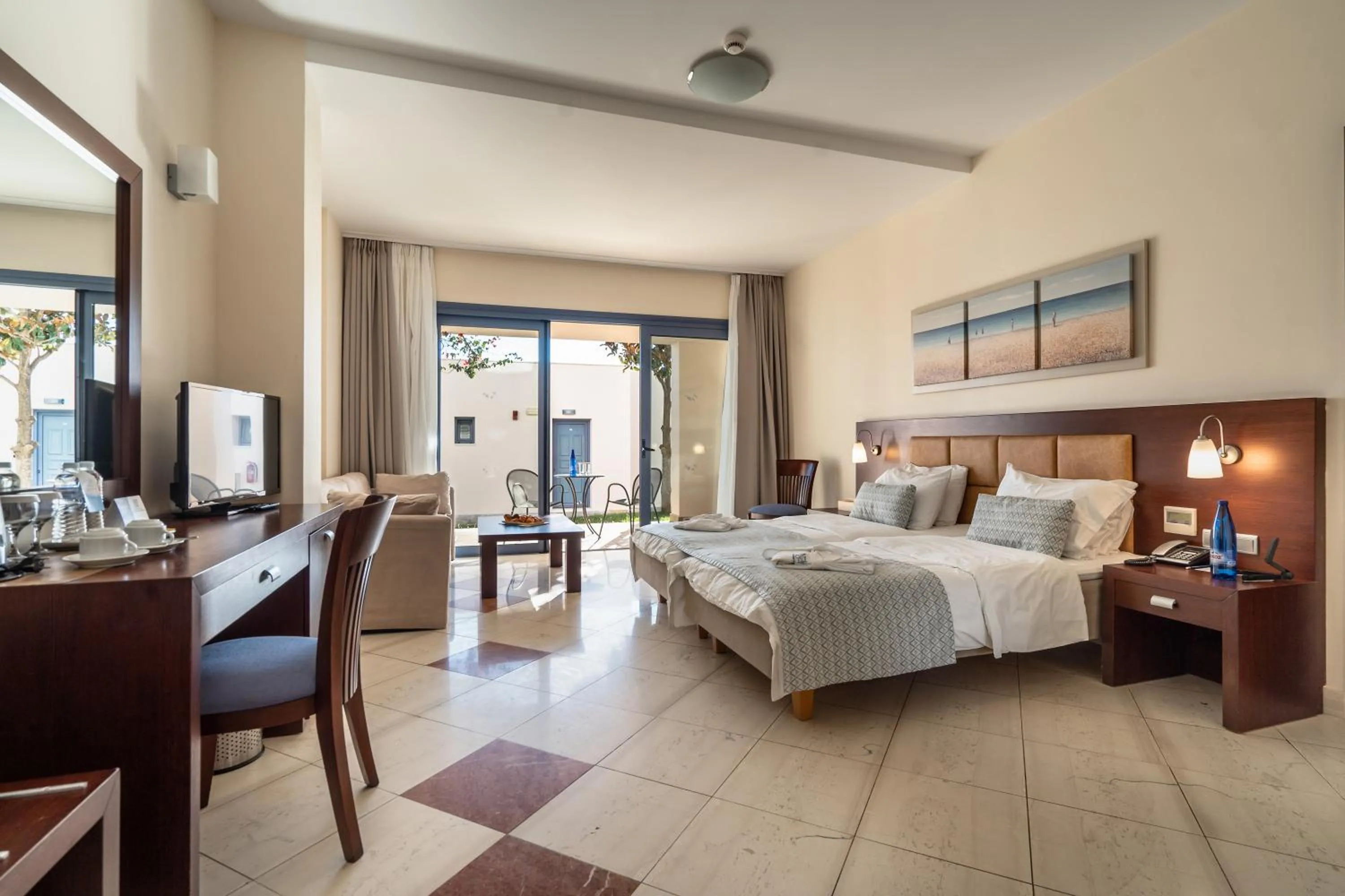 Bed in Porto Galini Seaside Resort & Spa