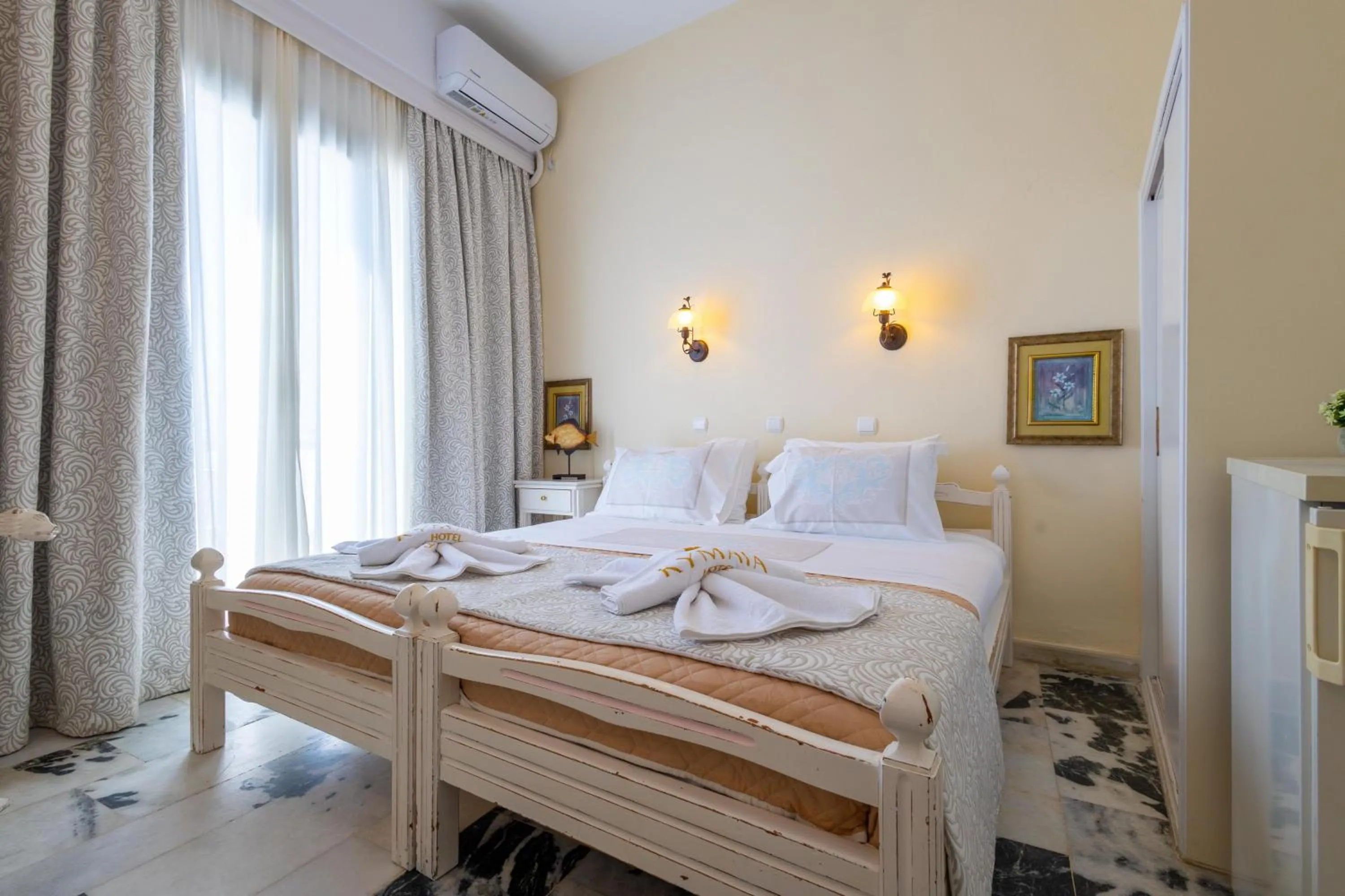 Bed in Kymata Hotel