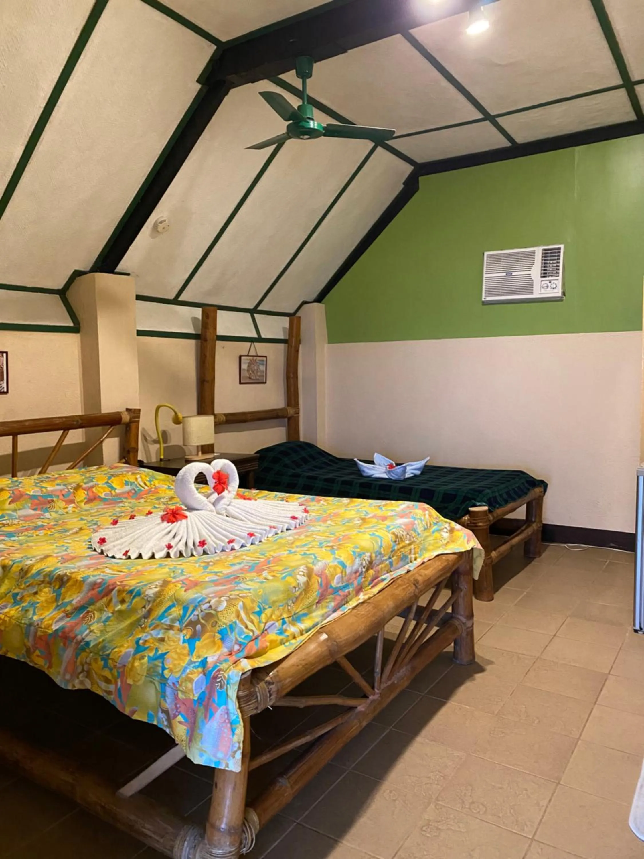 Bed in Ravenala Beach Bungalows