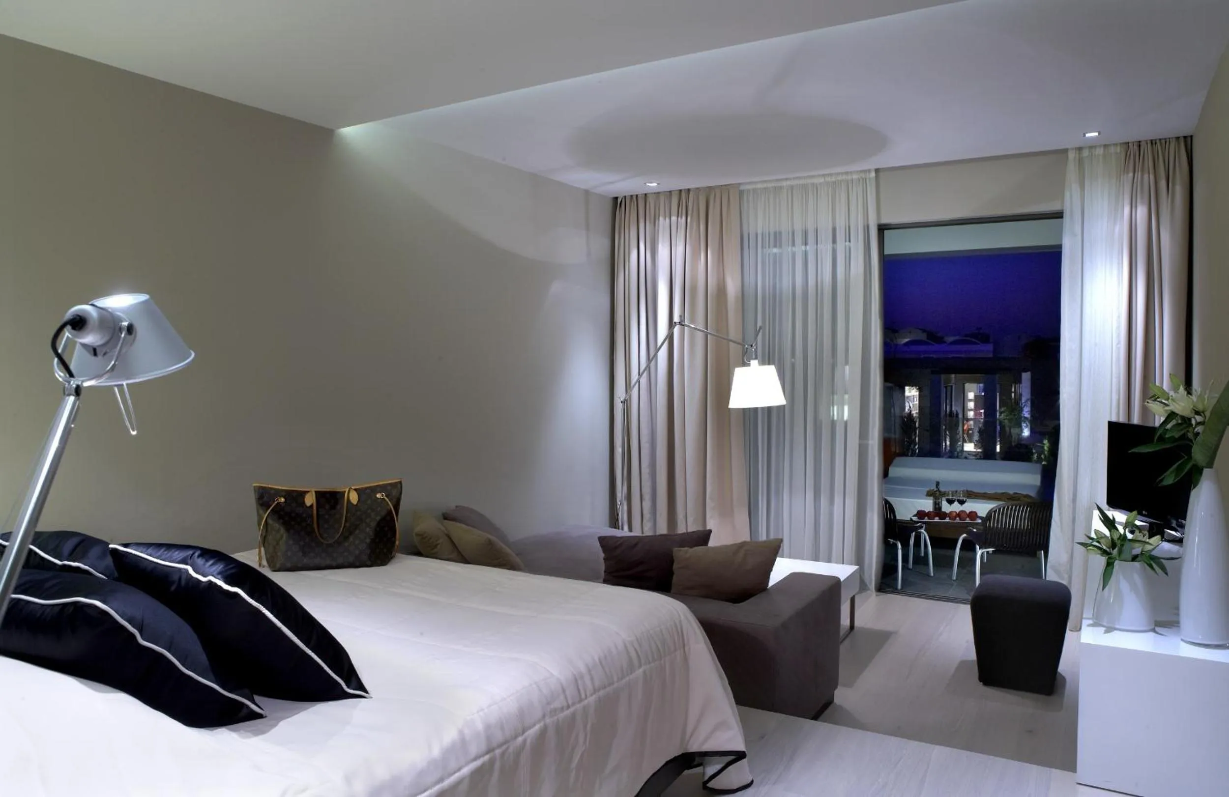 Photo of the whole room, Bed in Pelagos Suites Hotel & Spa