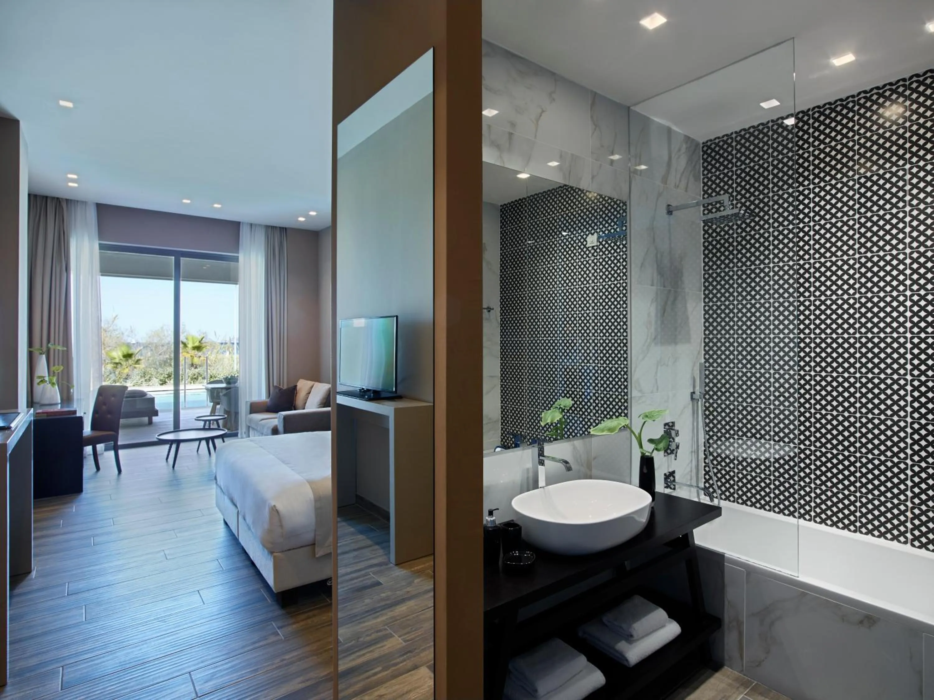 Bedroom in Pelagos Suites Hotel & Spa