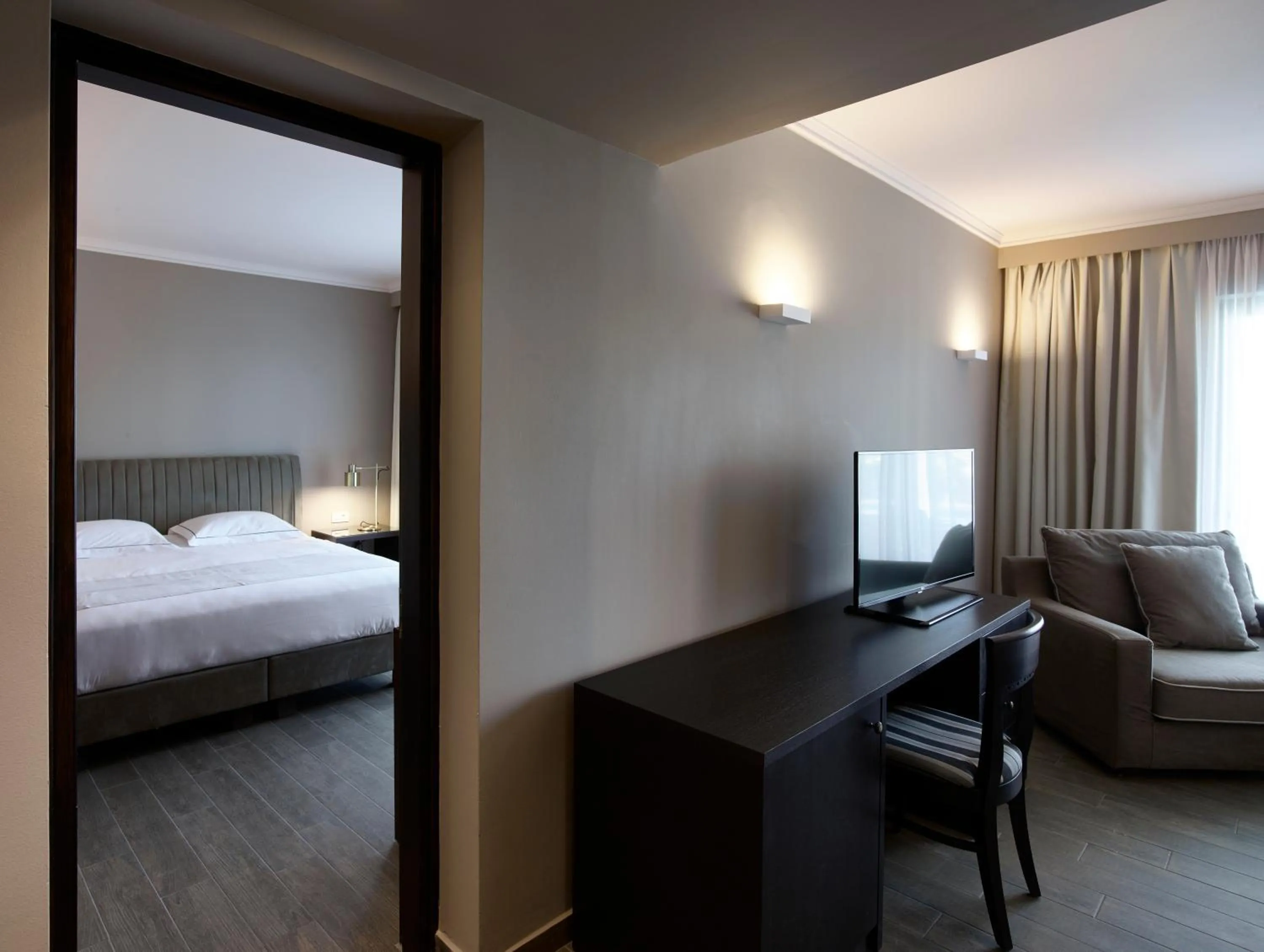 Photo of the whole room, Bed in Pelagos Suites Hotel & Spa