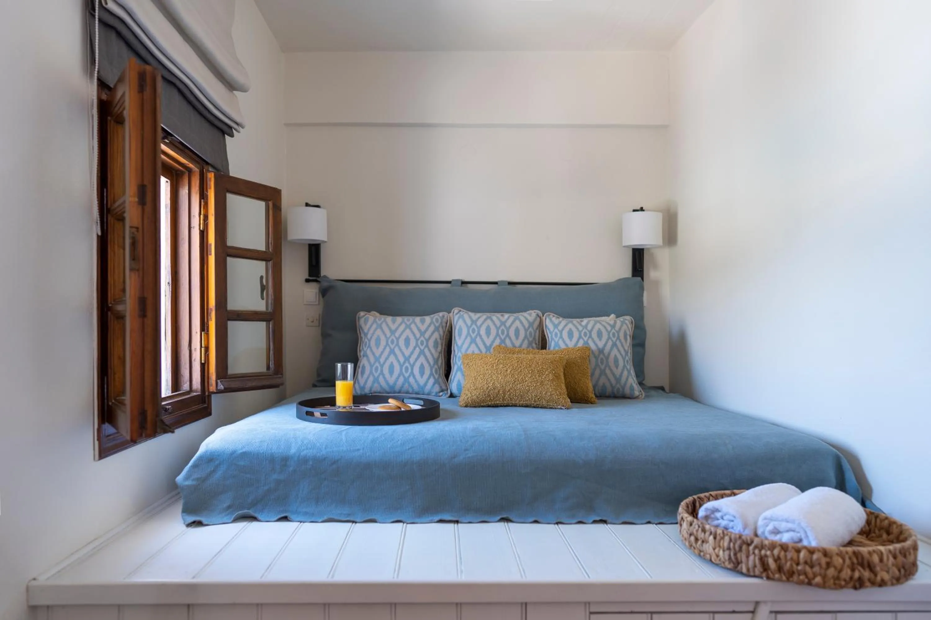 Bed in Maris Lindos Suites & Apartments