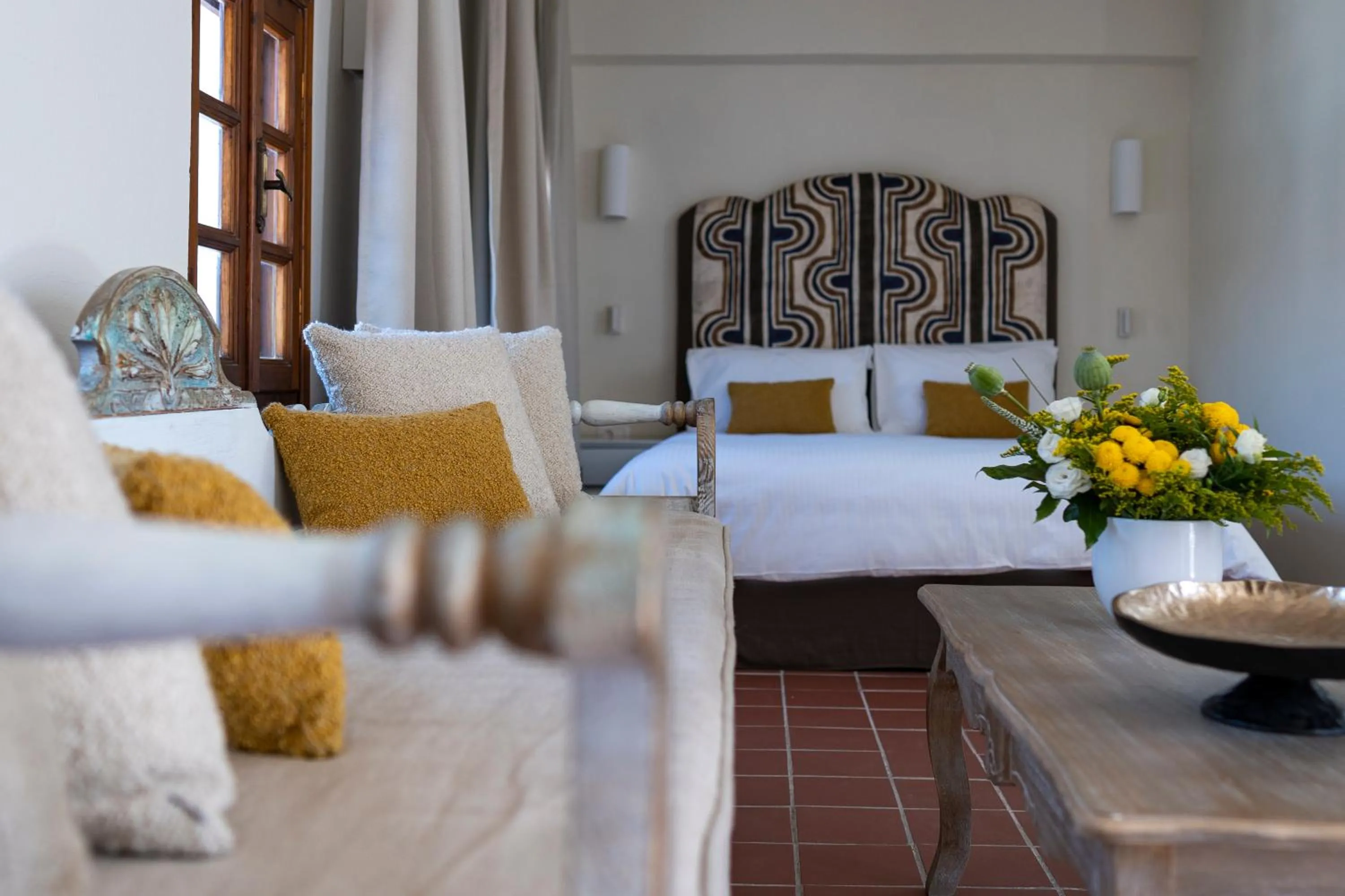 Bed in Maris Lindos Suites & Apartments