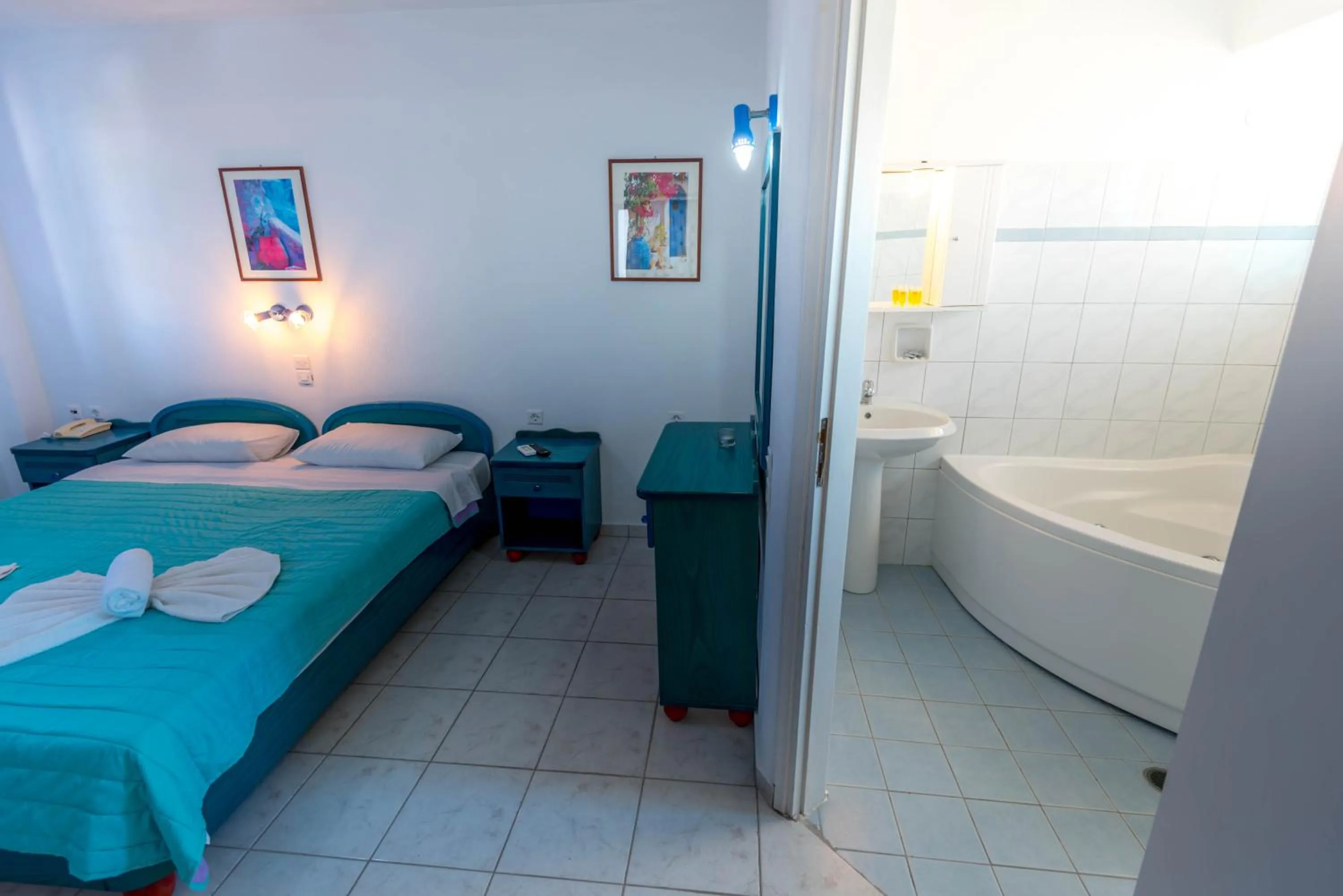 Photo of the whole room, Bed in Caldera View Resort - Adults Only