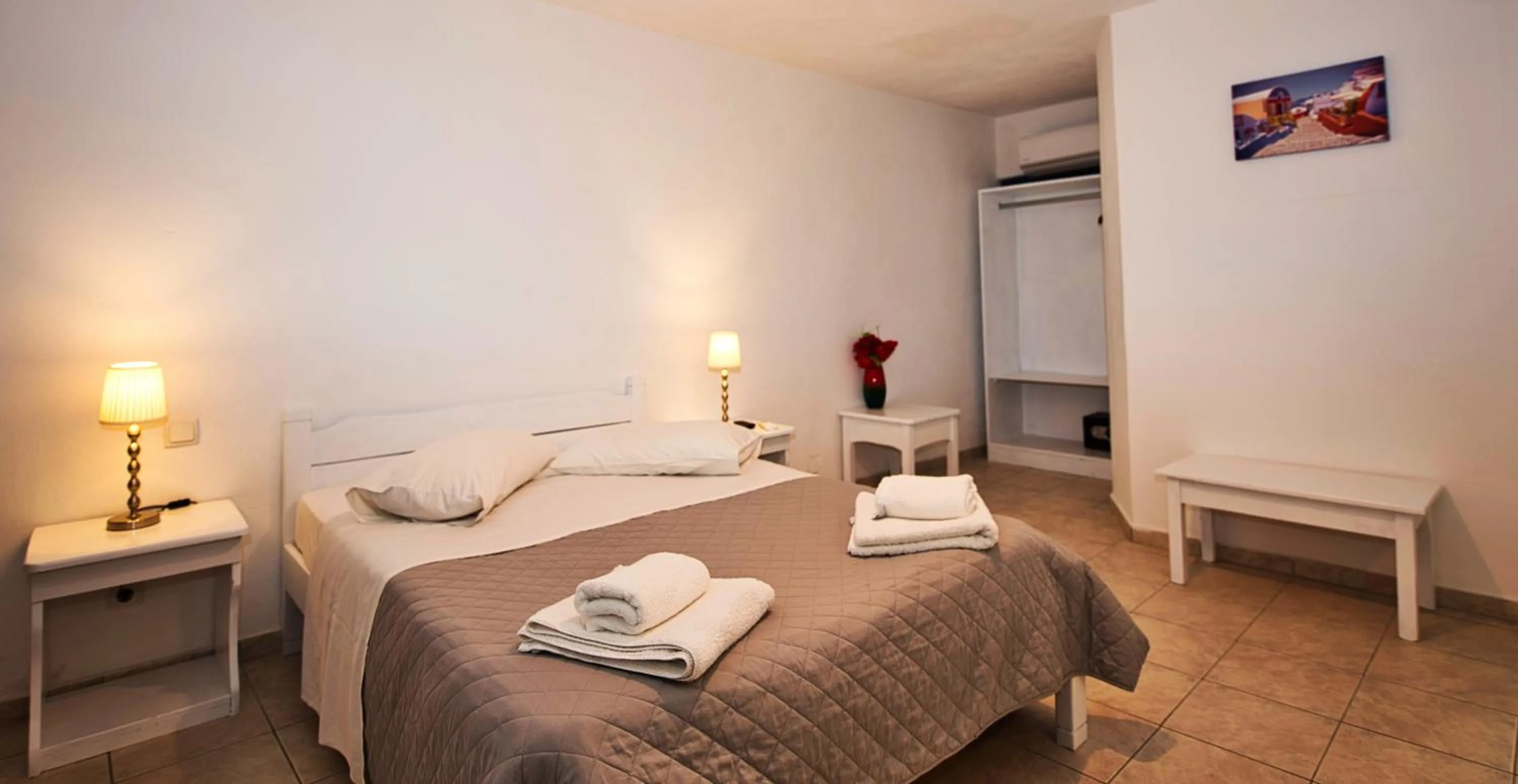 Bed in Caldera View Resort - Adults Only