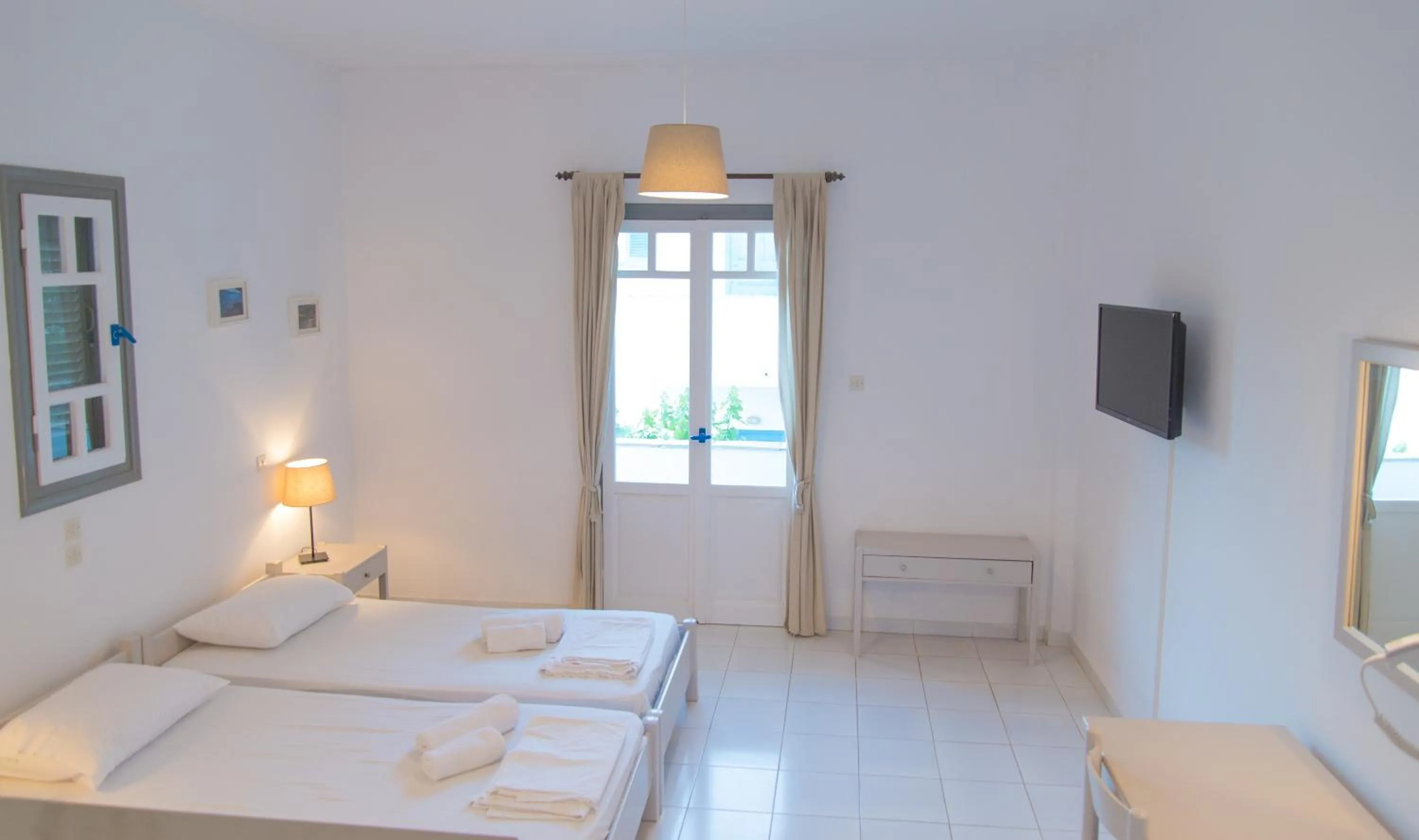 Bed in Ostria Hotel & Apartments