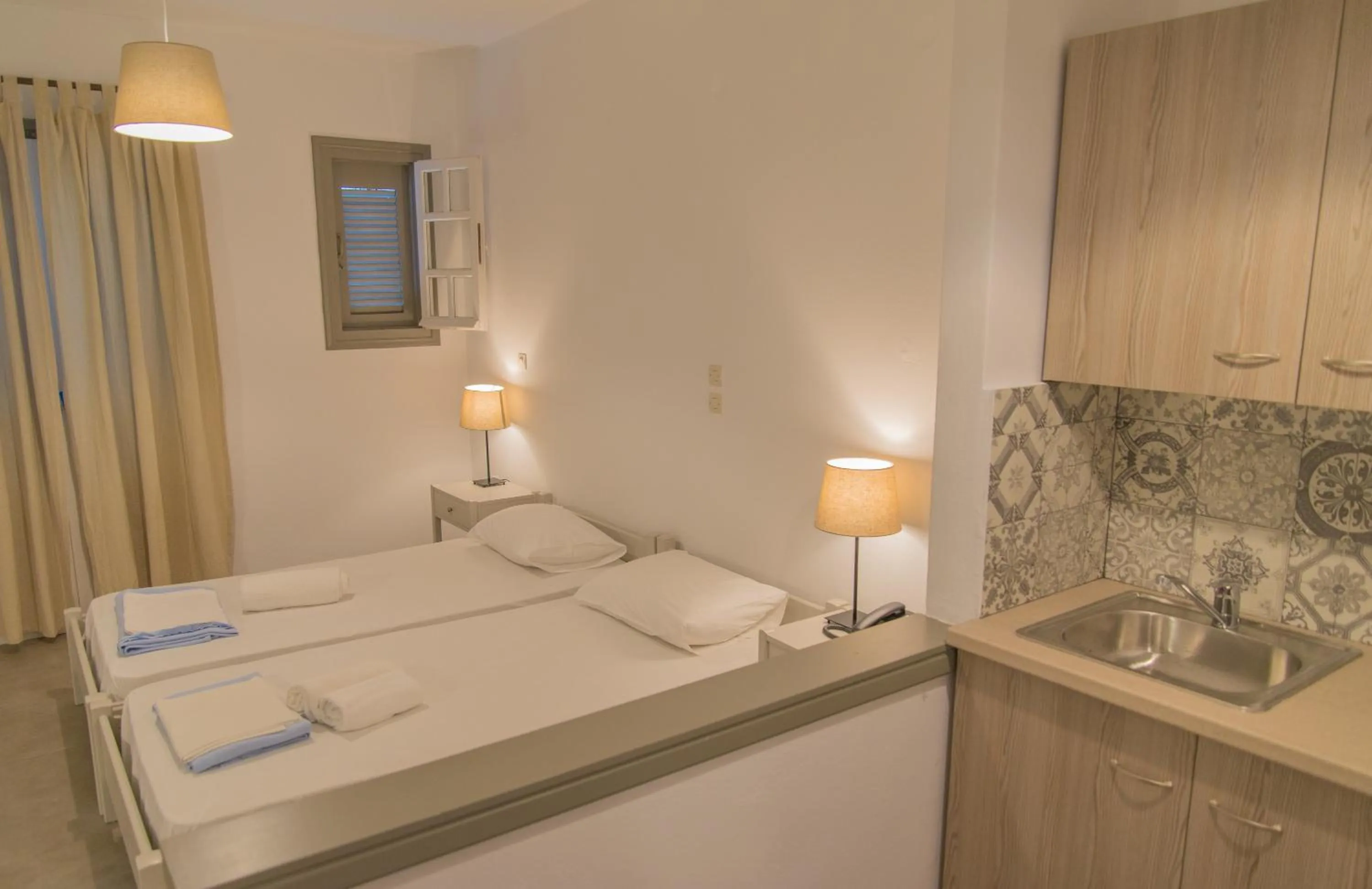 Bed in Ostria Hotel & Apartments